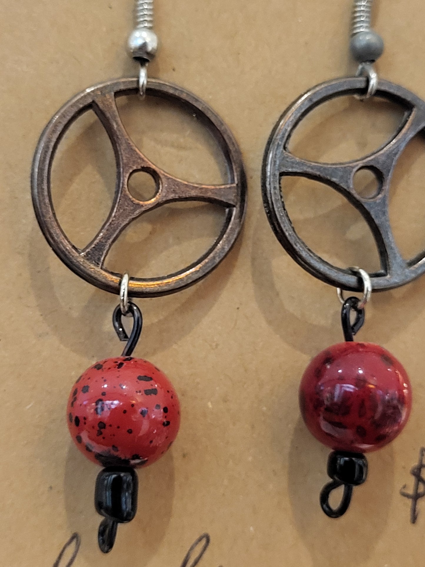 Handmade round gear and red bead earrings