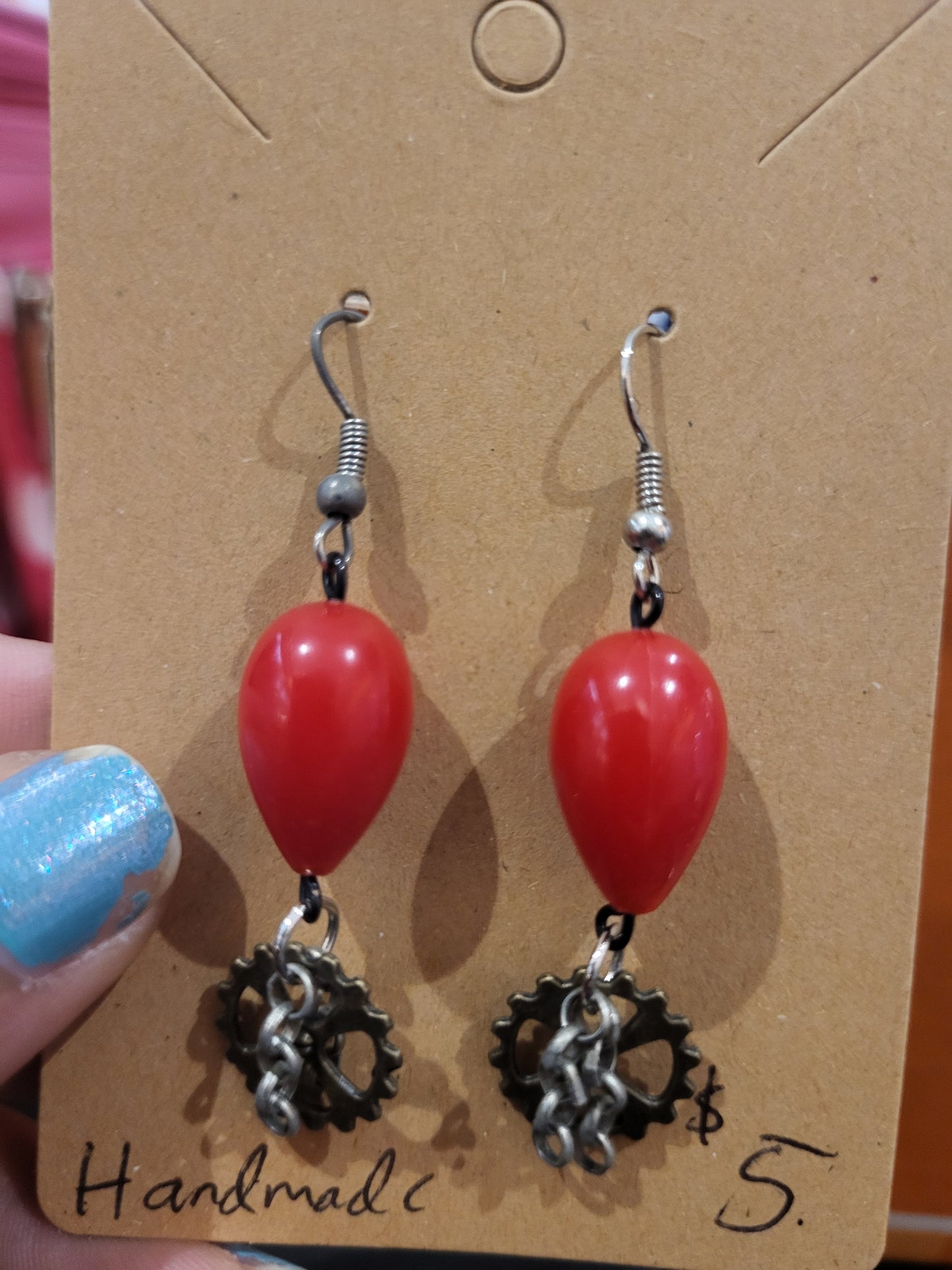 Handmade red teardrop bead earrings with gear