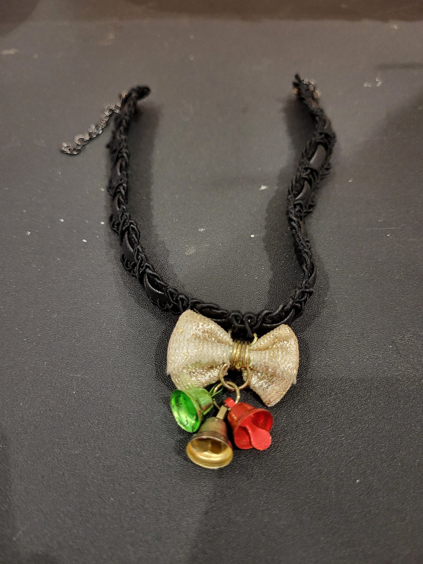 Handmade black and gold choker with jingle bells