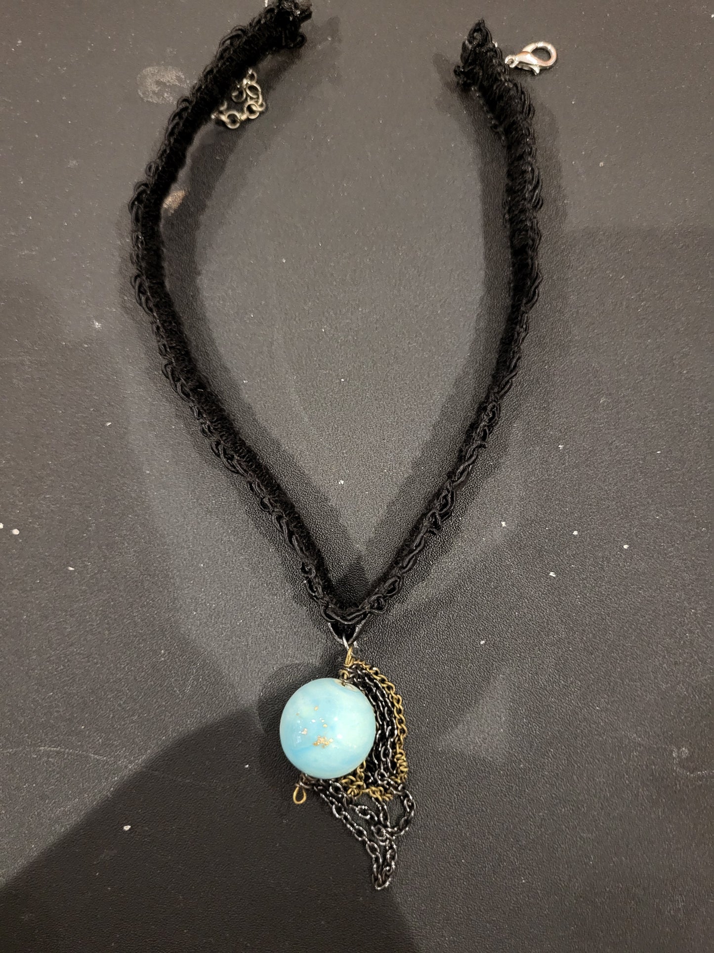Handmade black choker with blue bead and chain detail