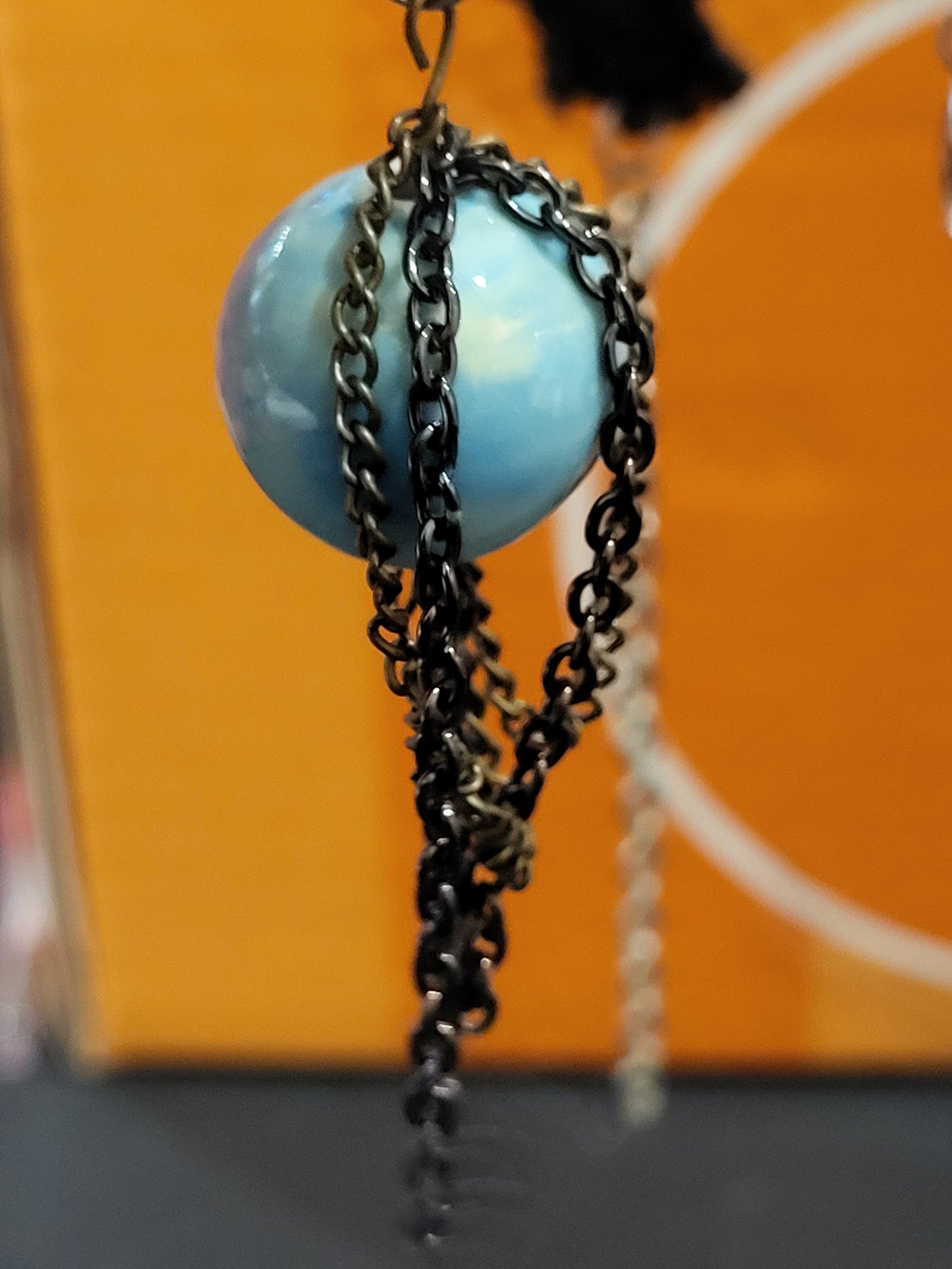 Handmade black choker with blue bead and chain detail