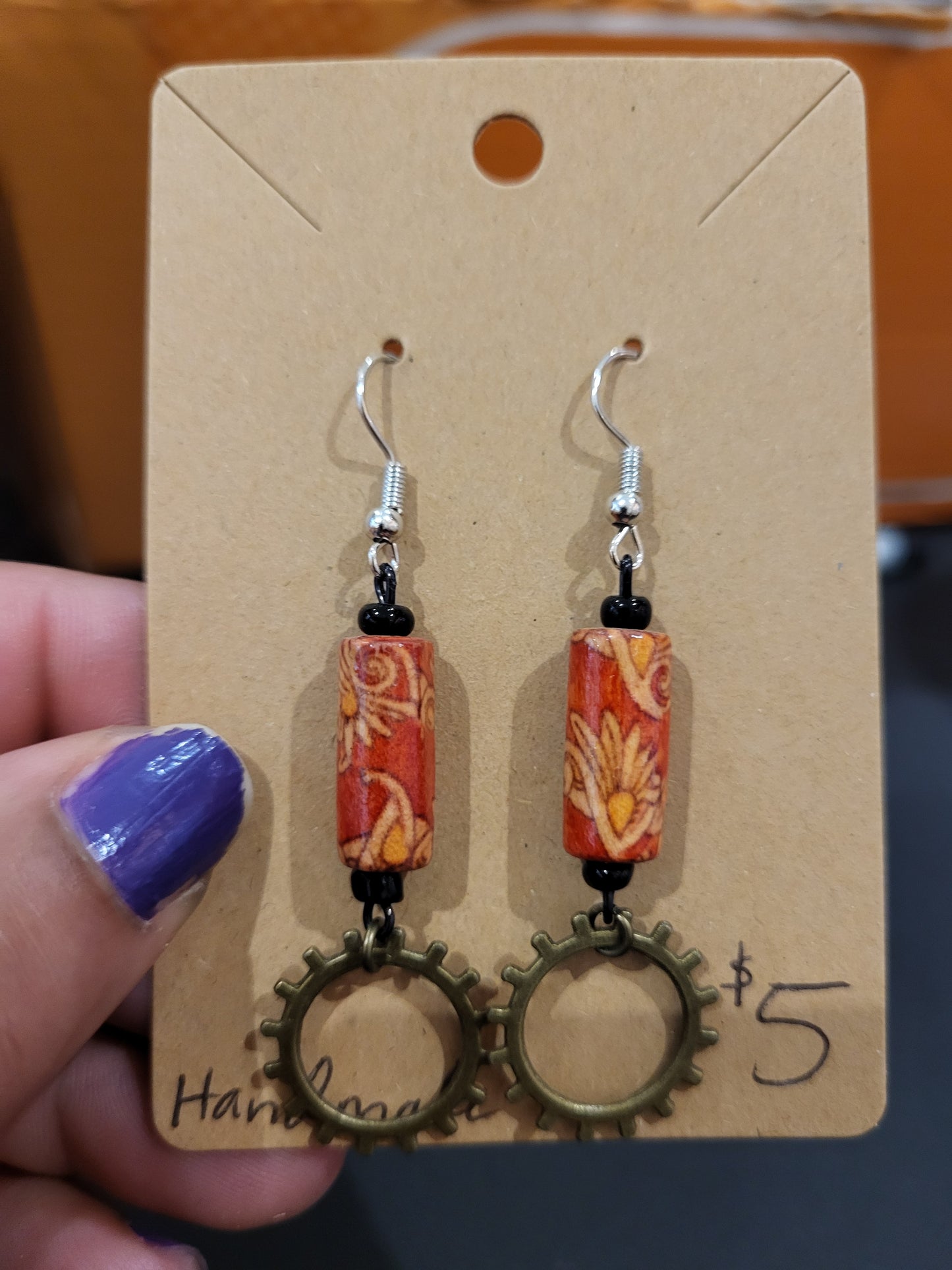Handmade ornate red bead and gear earrings bottom