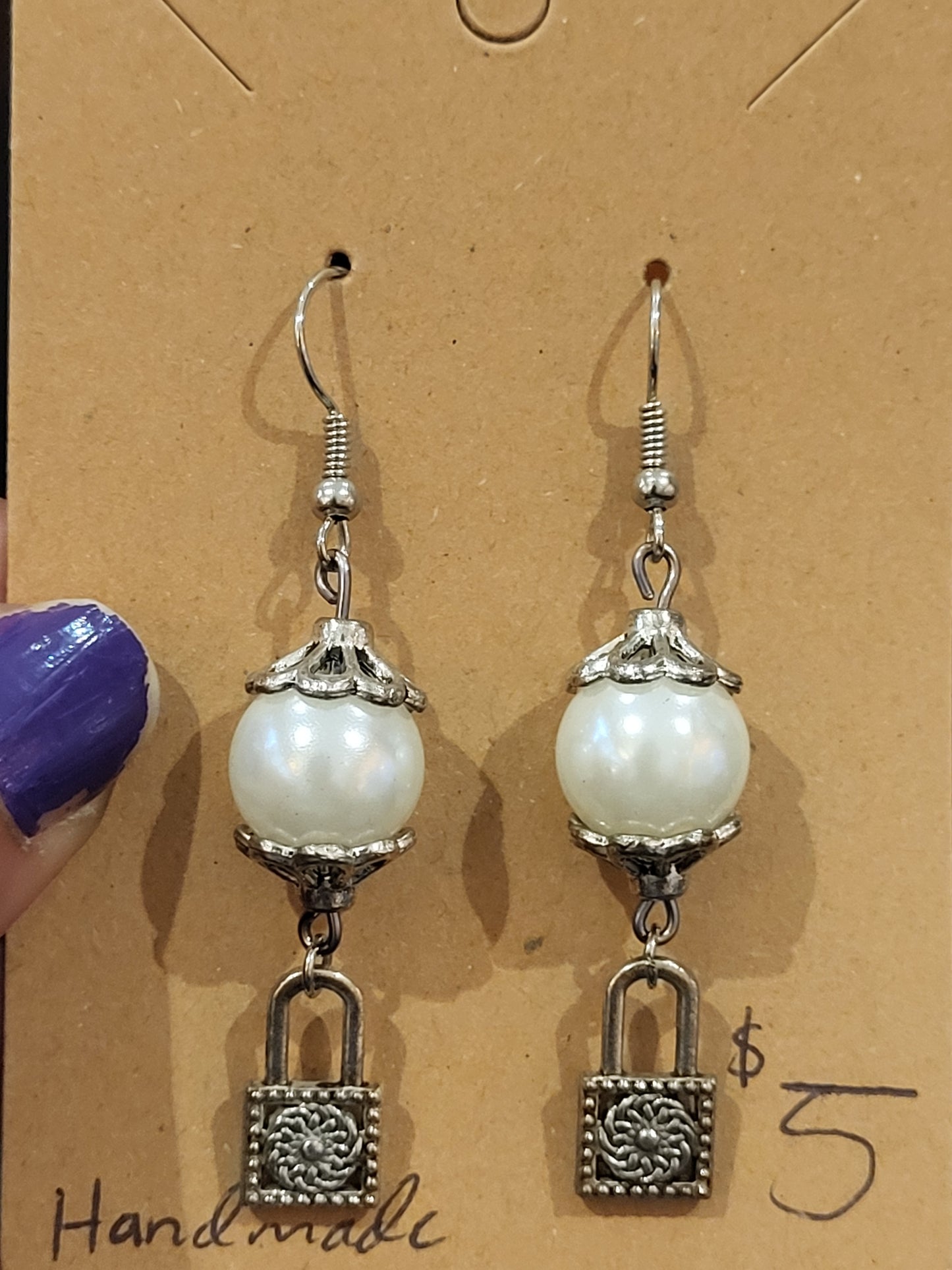 Handmade white and silver earrings with lock charm