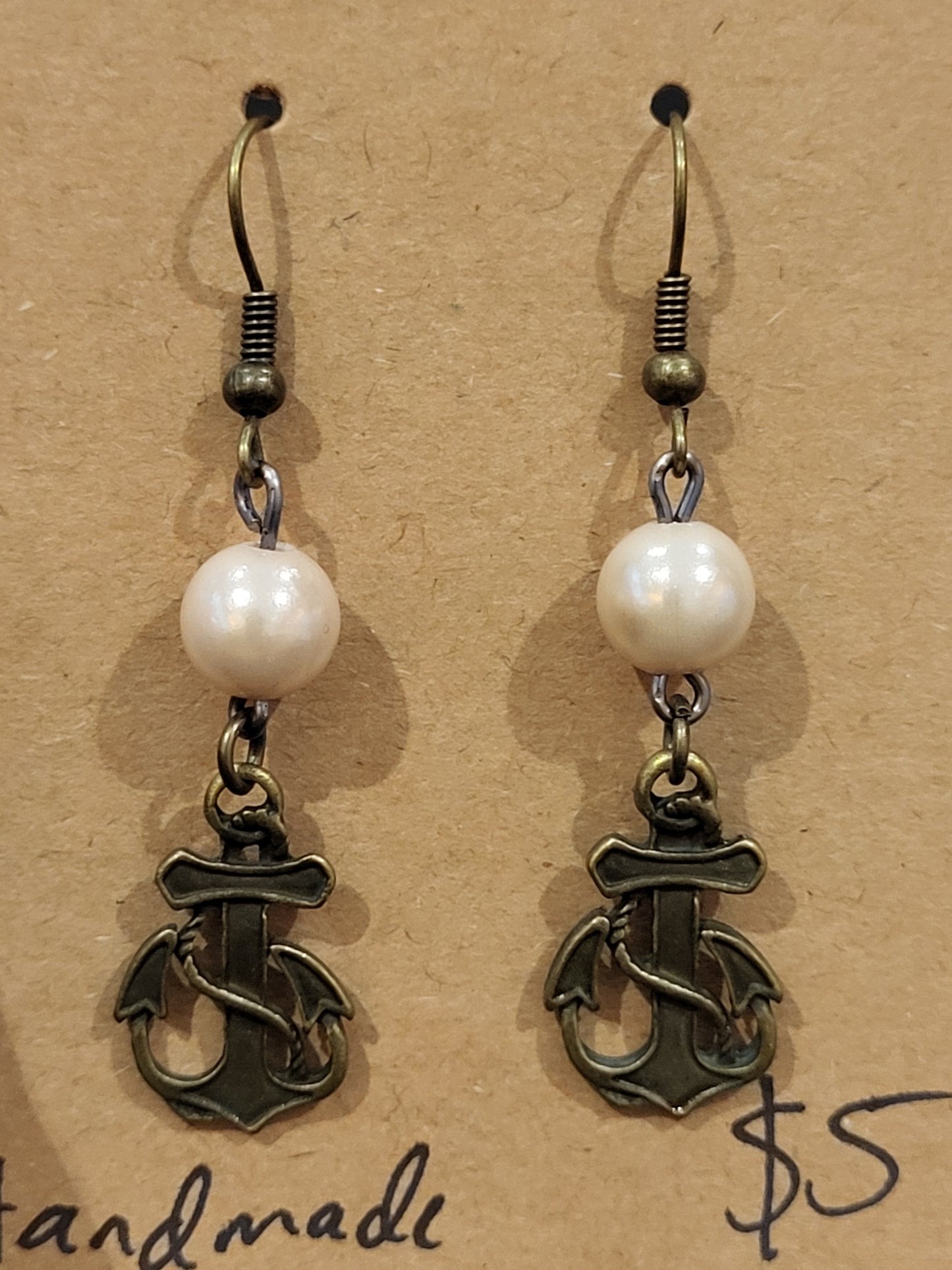 Handmade simple beige bead earrings with anchor charm
