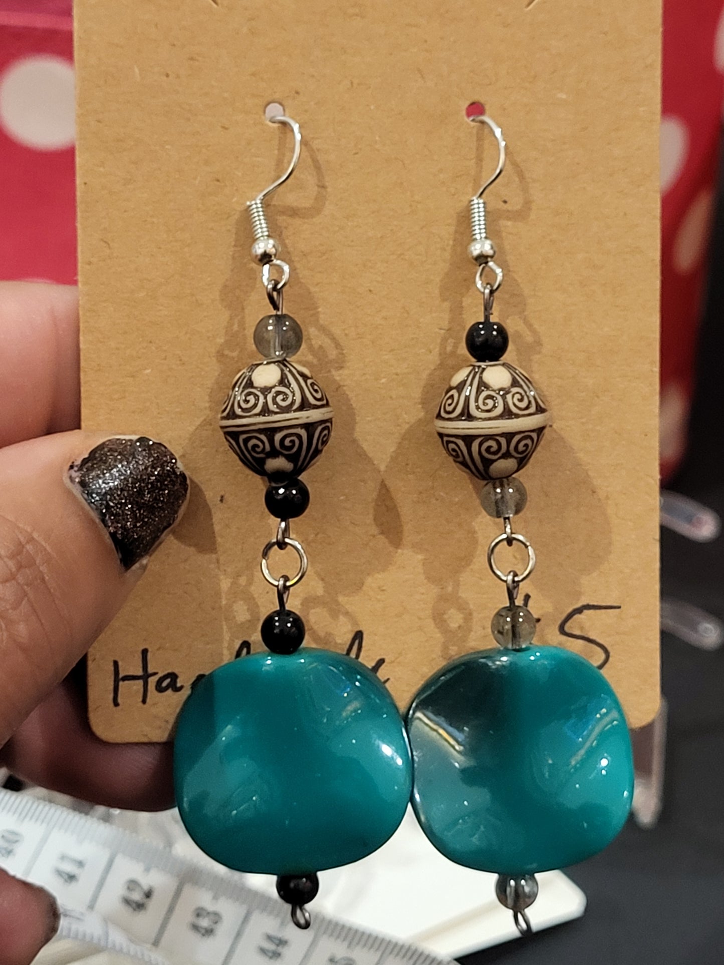 Handmade wavy green bead earrings