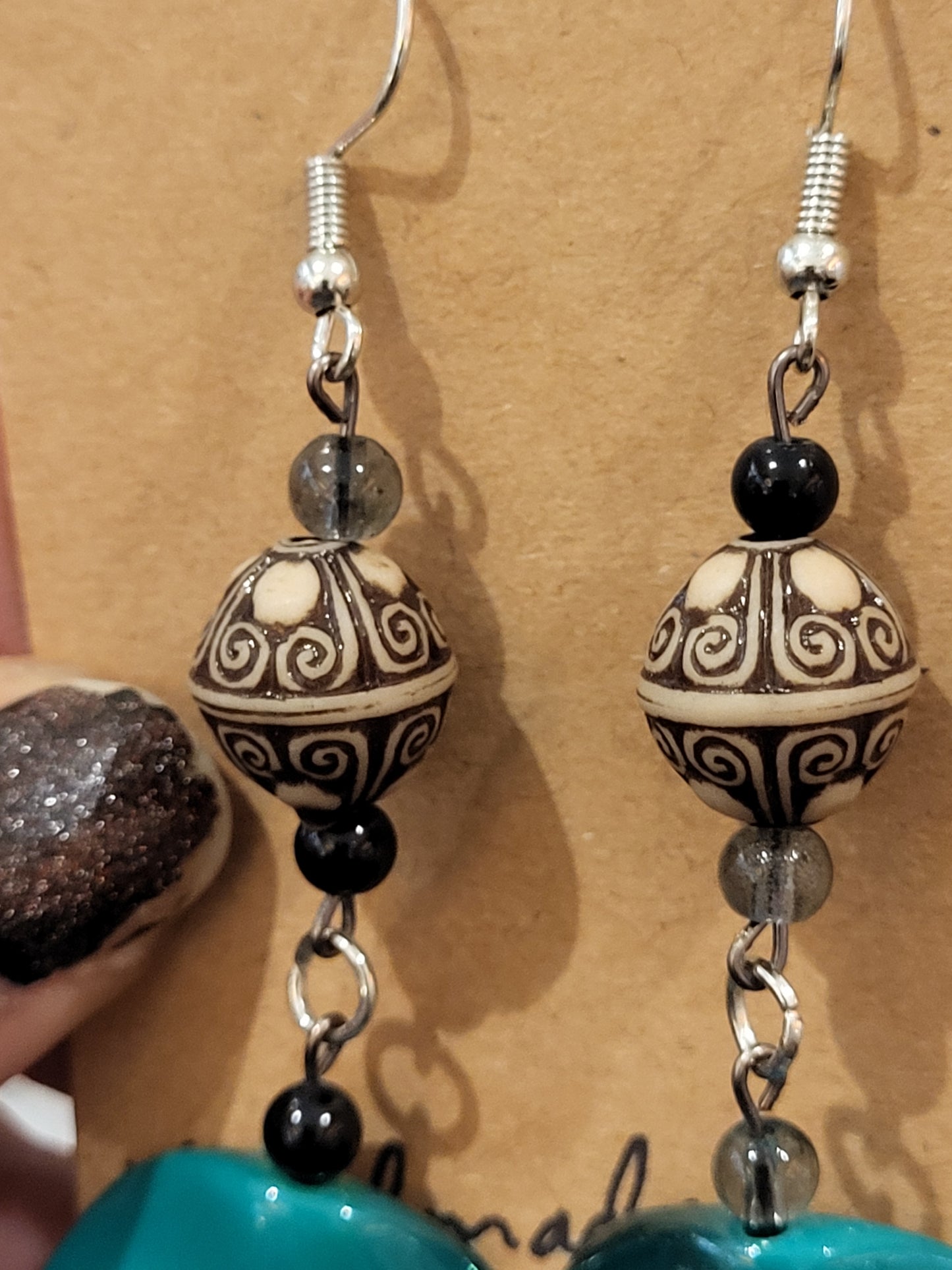 Handmade wavy green bead earrings