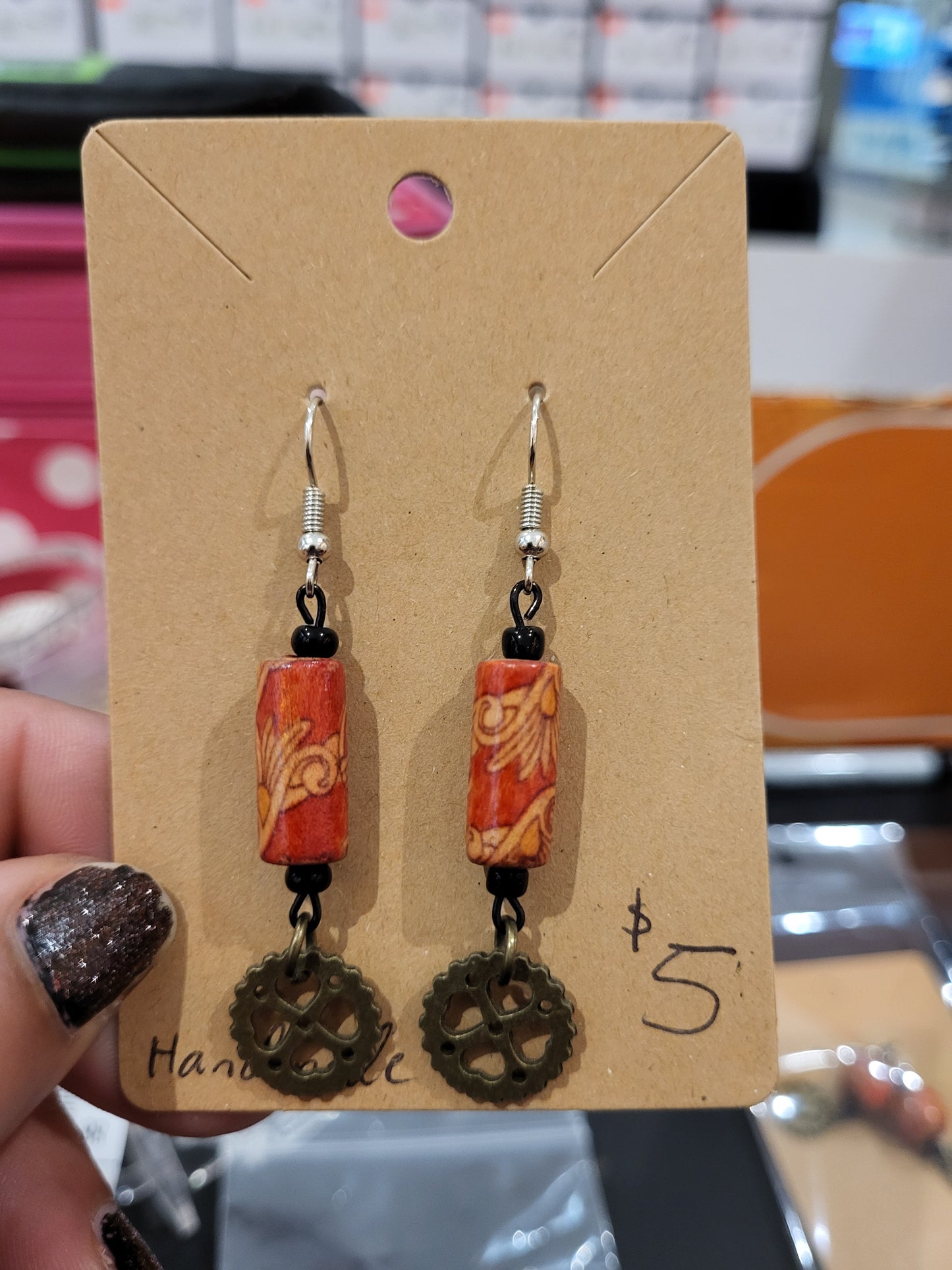 Handmade ornate red bead and heart gear earrings