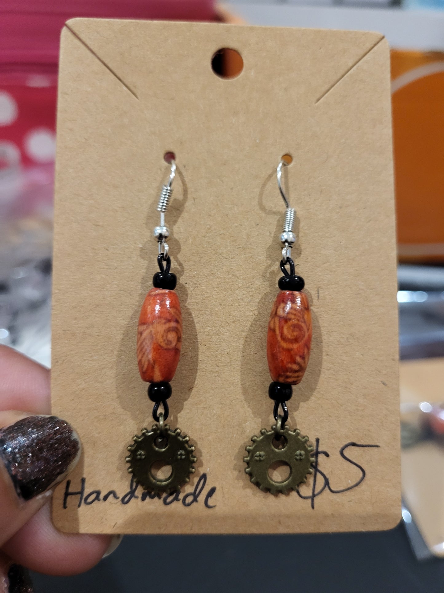Handmade ornate red bead and heart gear earrings bottom