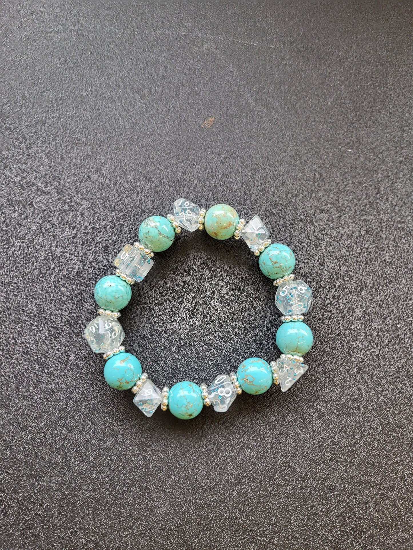 Light blue marbled bead and clear dice stretch bracelet