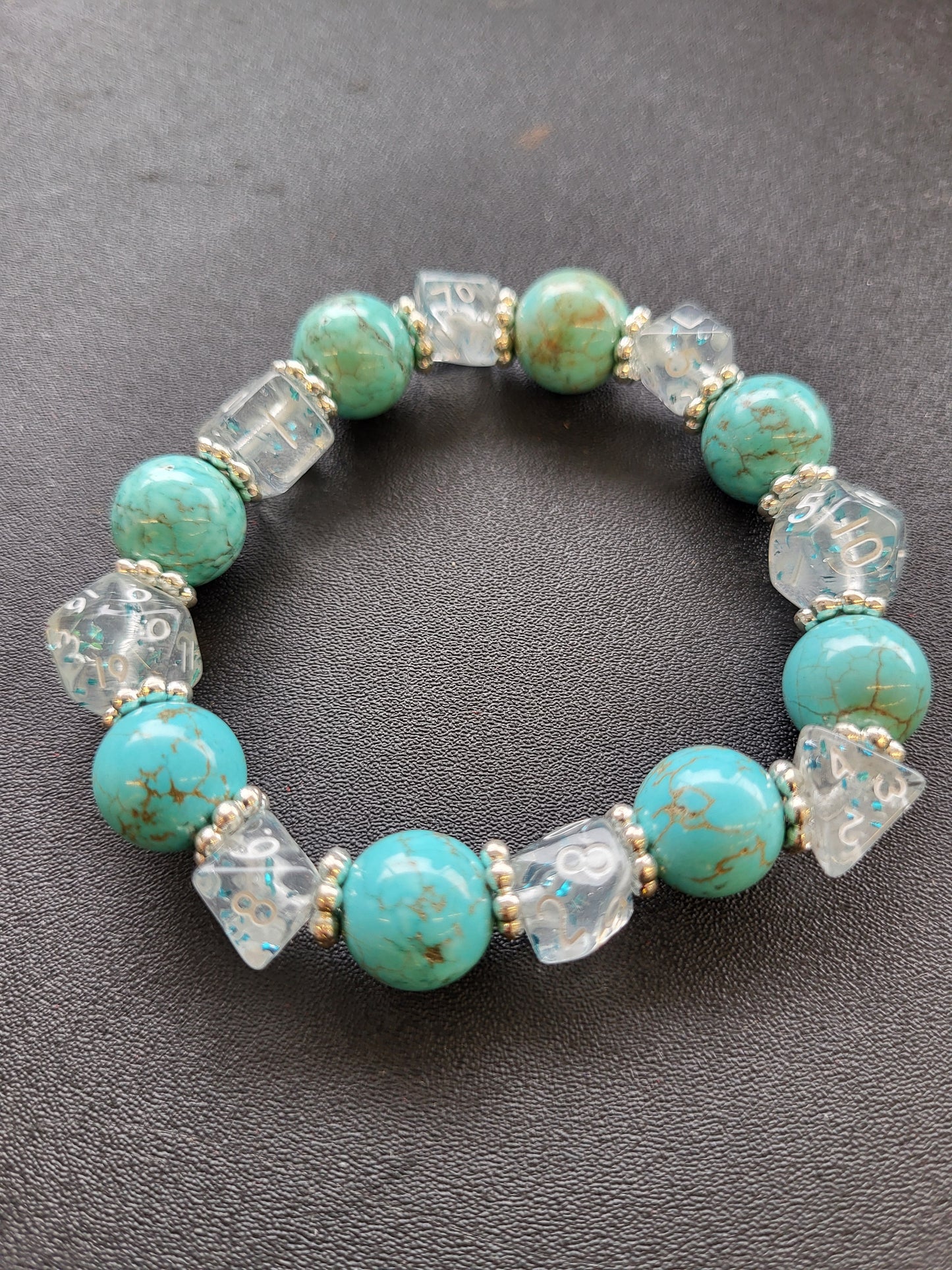 Light blue marbled bead and clear dice stretch bracelet