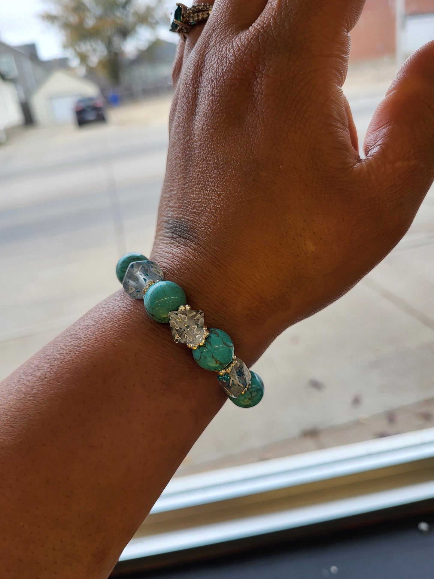 Light blue marbled bead and clear dice stretch bracelet