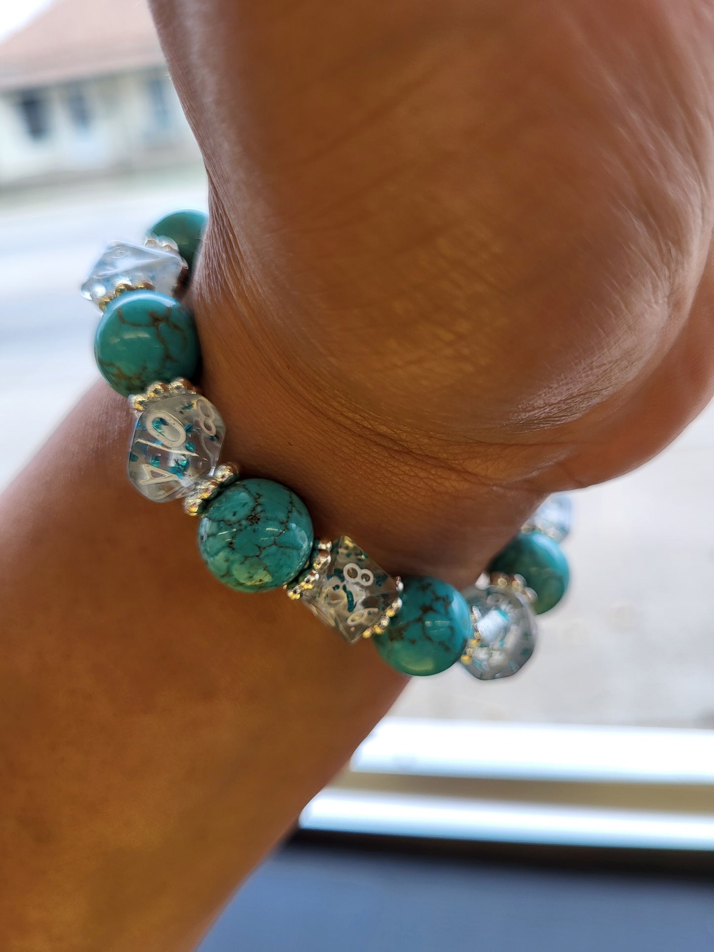 Light blue marbled bead and clear dice stretch bracelet