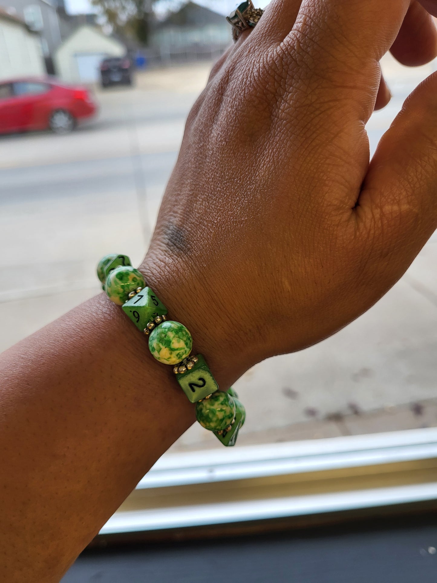 Green and yellow marbled bead and lime green dice stretch bracelet