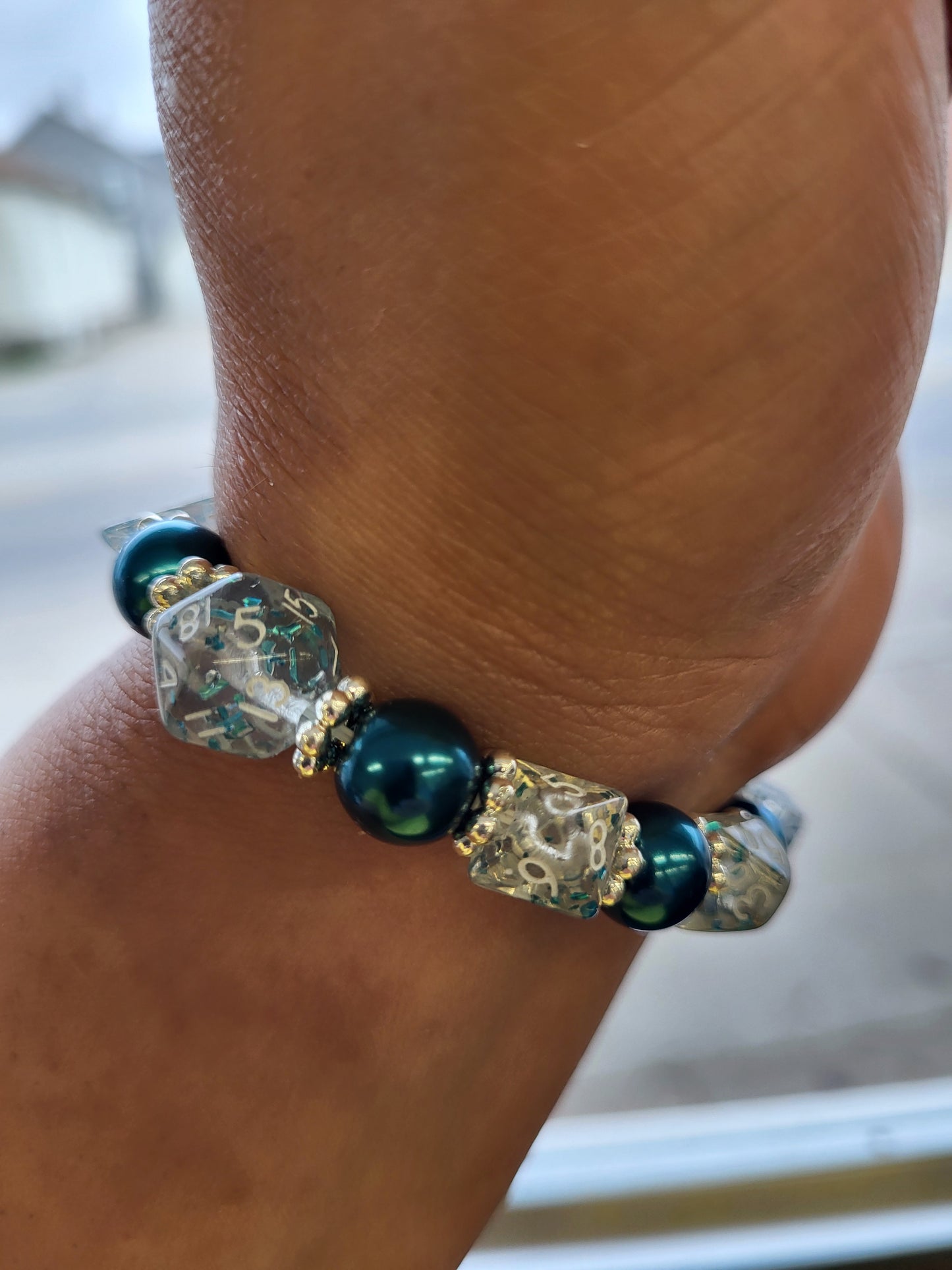 Teal bead and clear mini dice stretch bracelet