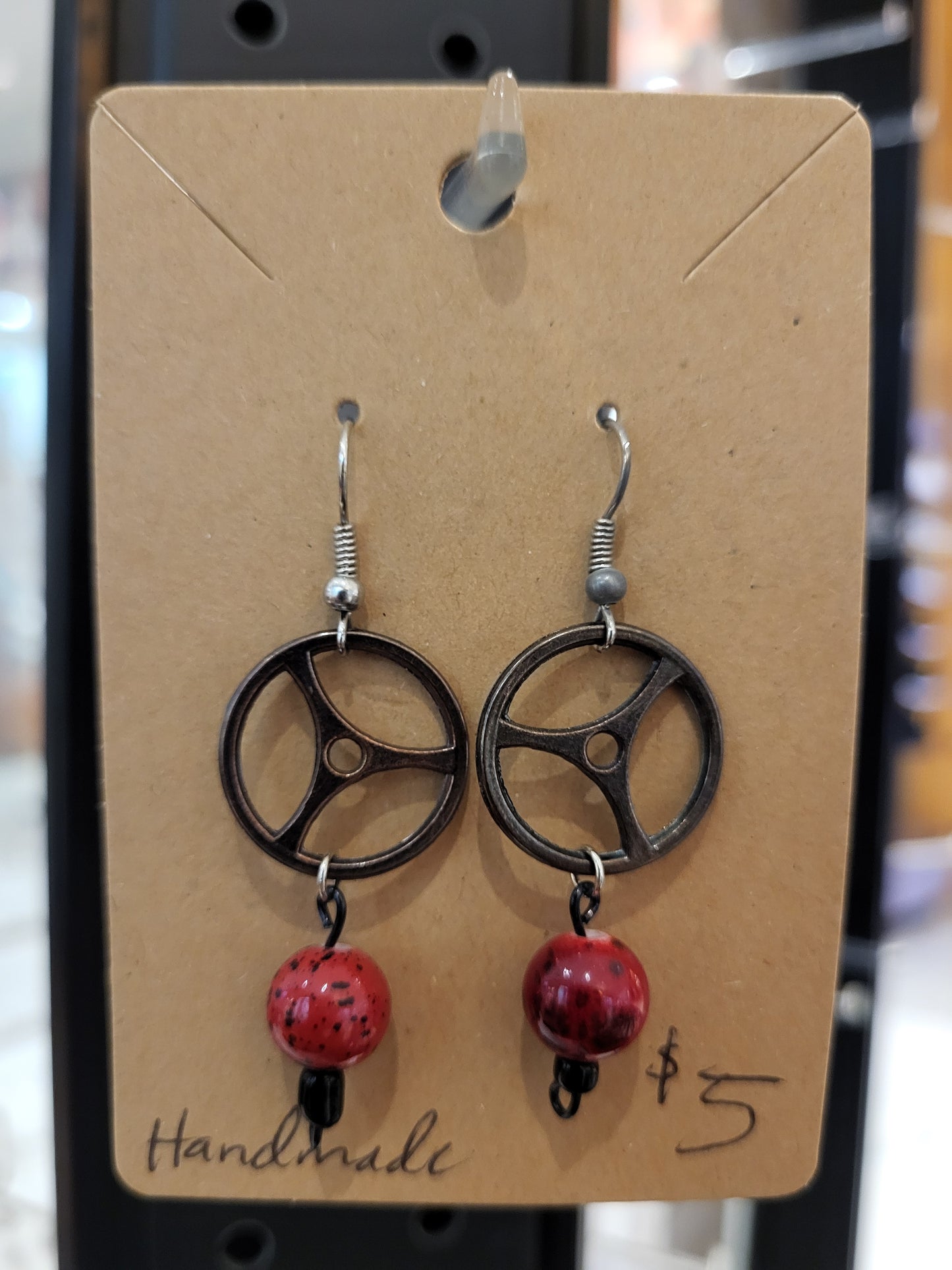 Handmade round gear and red bead earrings