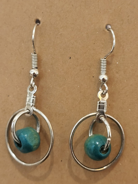 Handmade ring within a ring Teal bead earrings