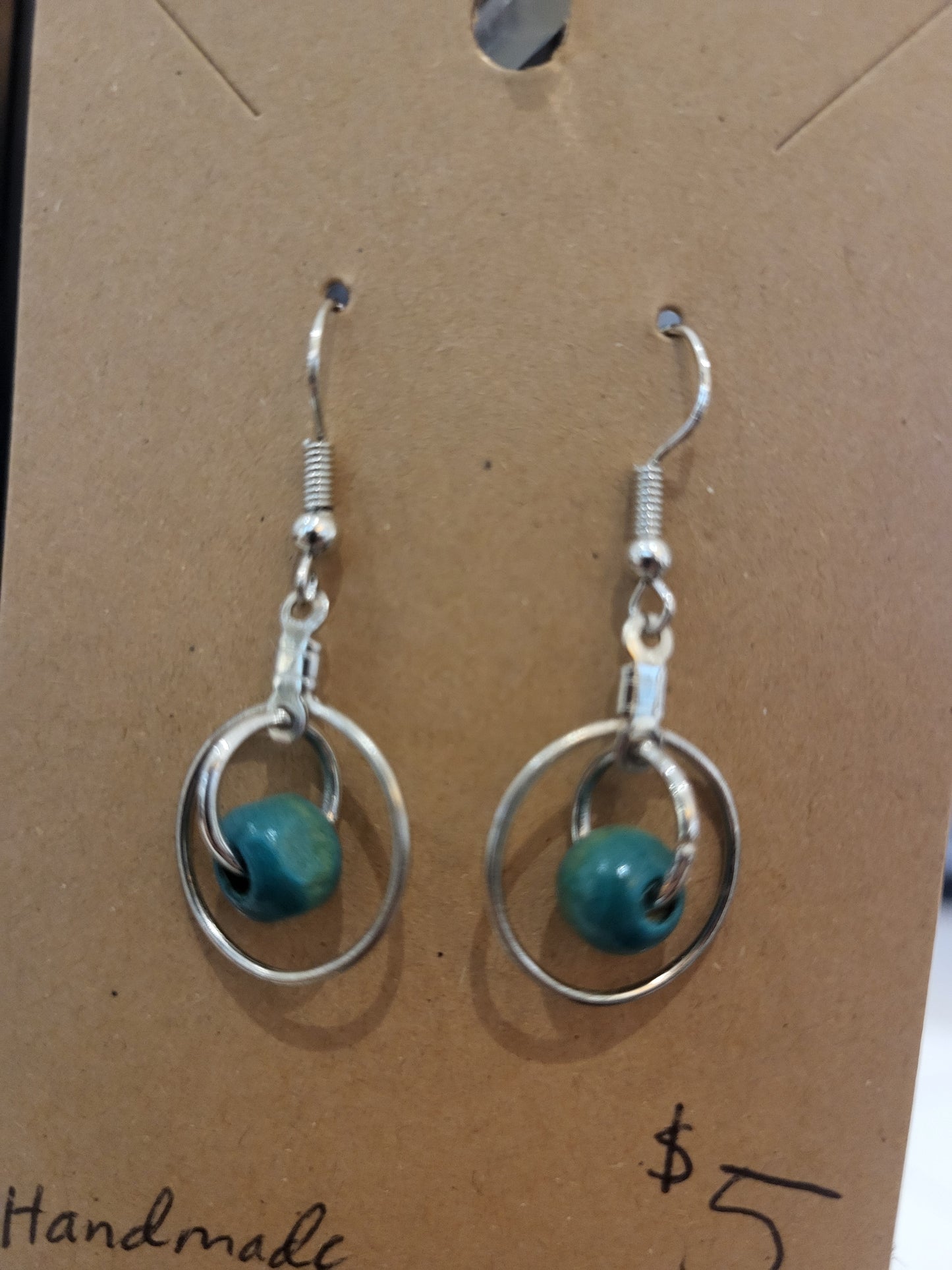 Handmade ring within a ring Teal bead earrings