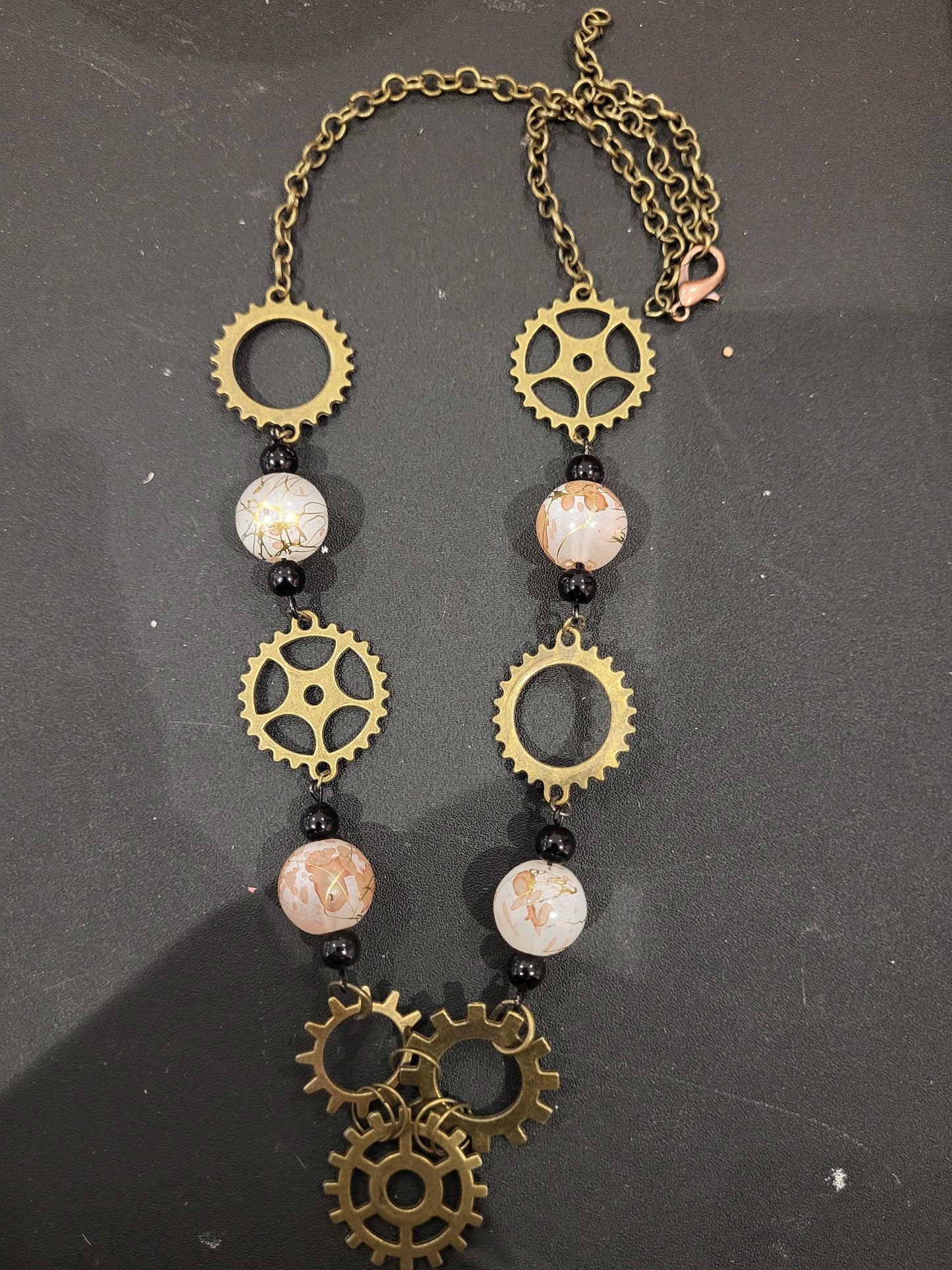 Handmade steampunk pink beads and gears necklace and earring set