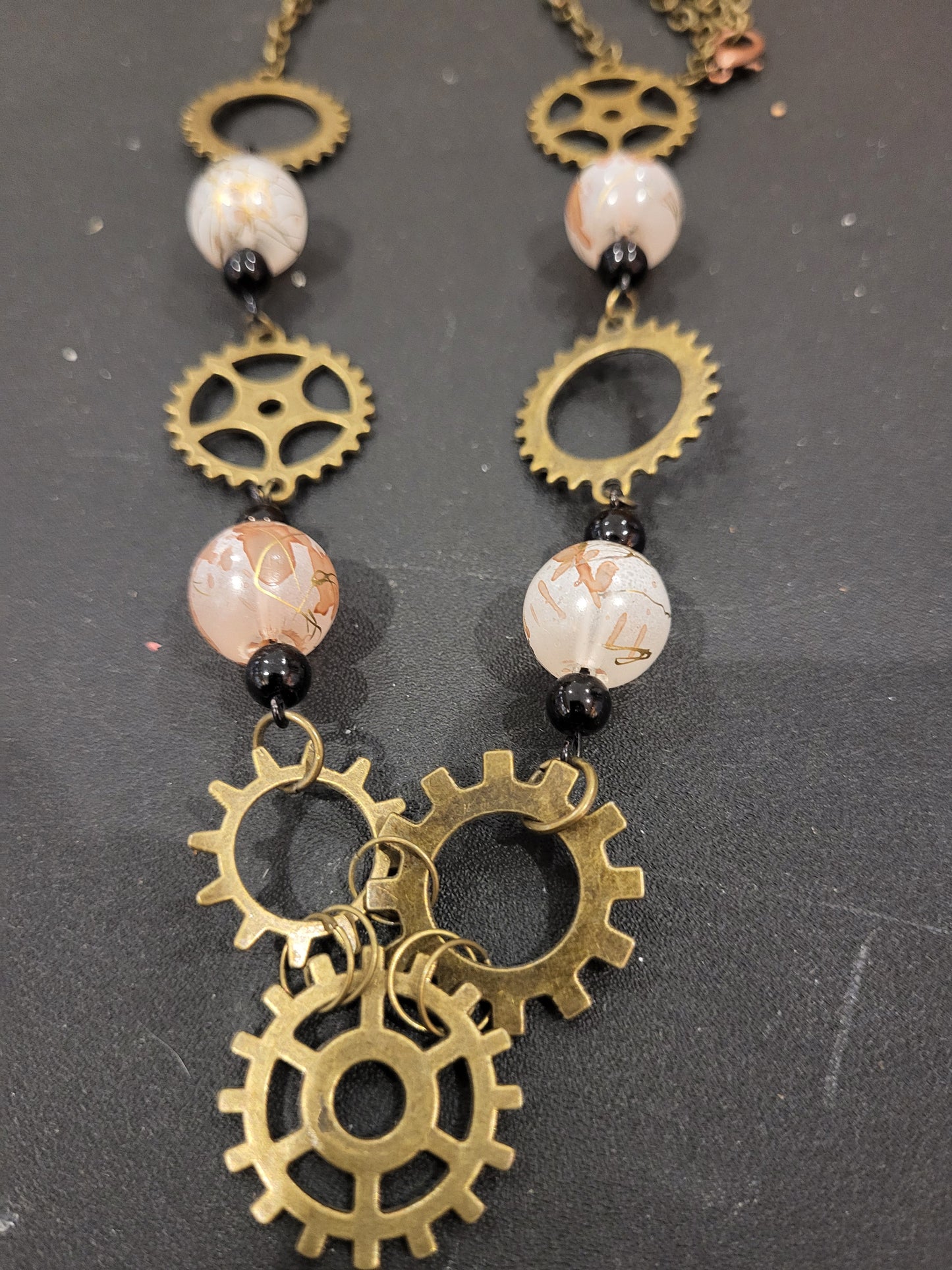 Handmade steampunk pink beads and gears necklace and earring set
