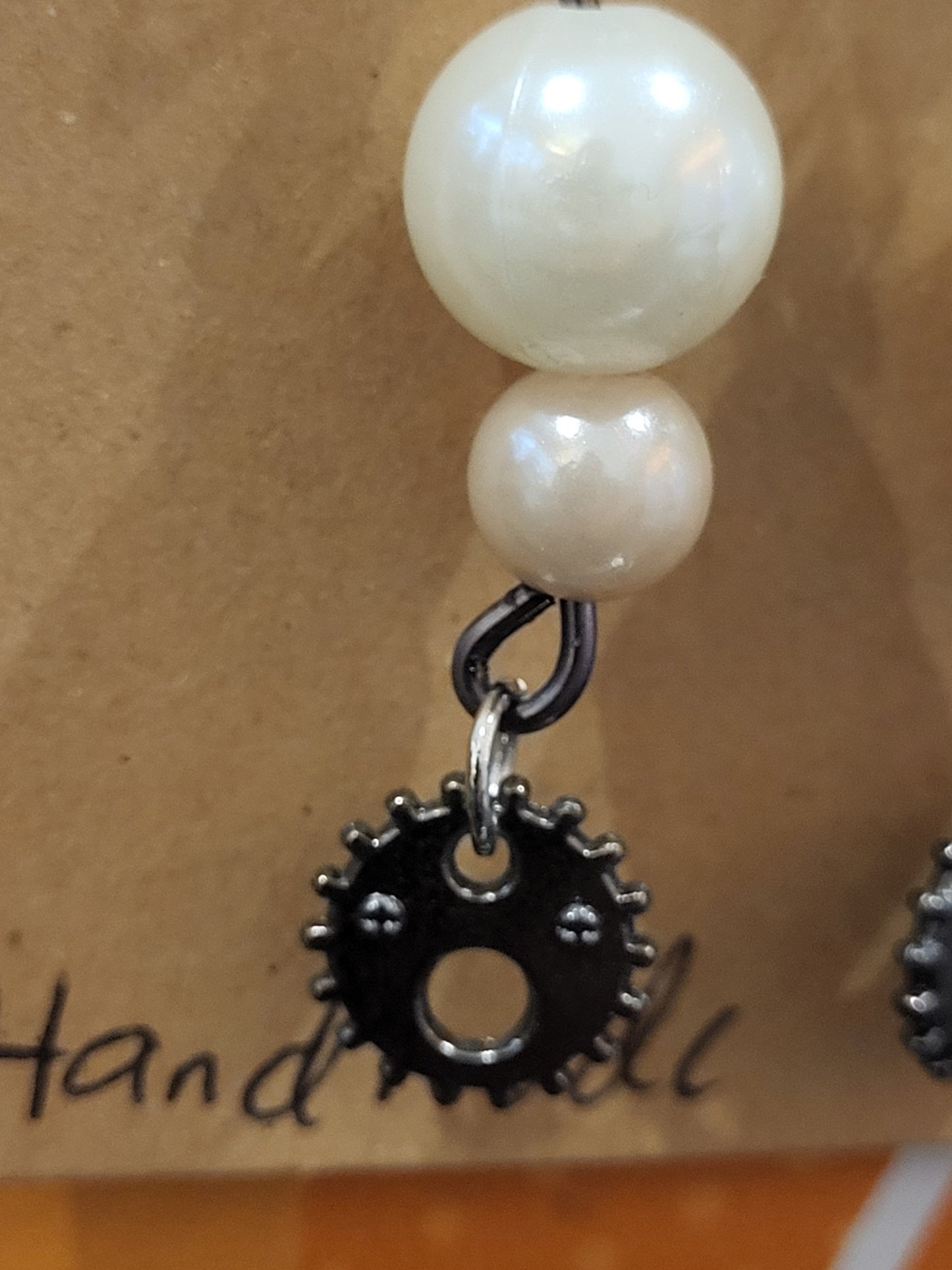 Handmade white and blush bead with black gear earrings