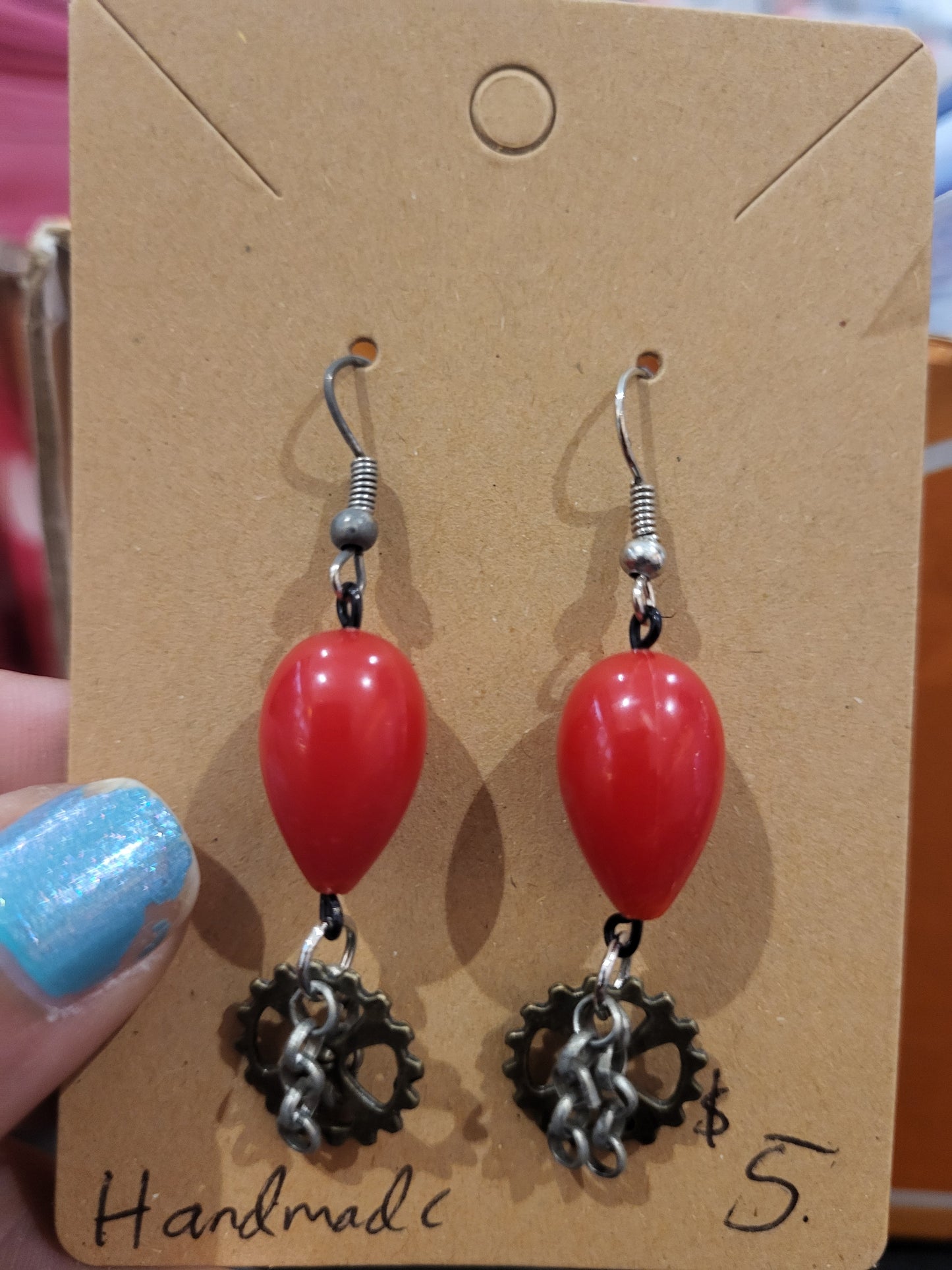 Handmade red teardrop bead earrings with gear