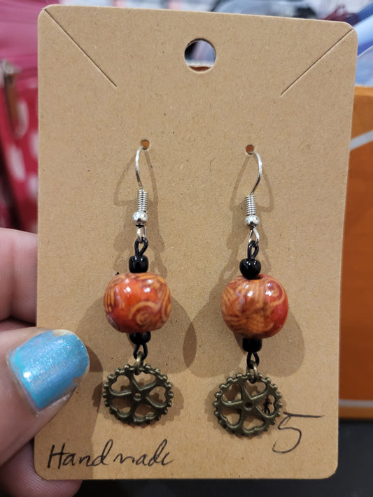 Handmade ornate red bead and heart gear earrings bottom