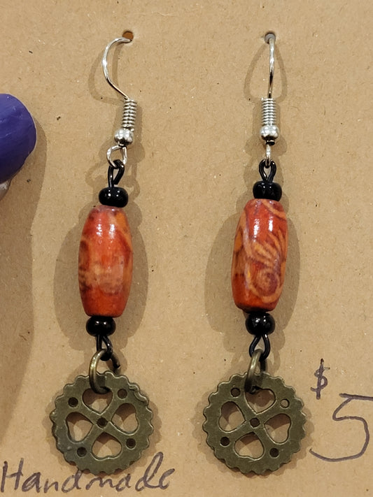 Handmade ornate red bead and heart gear earrings
