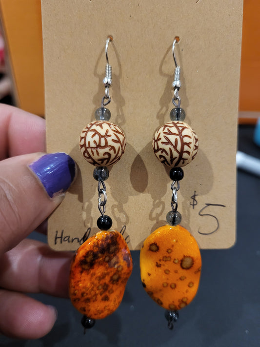 Handmade orange and tan dangle earrings