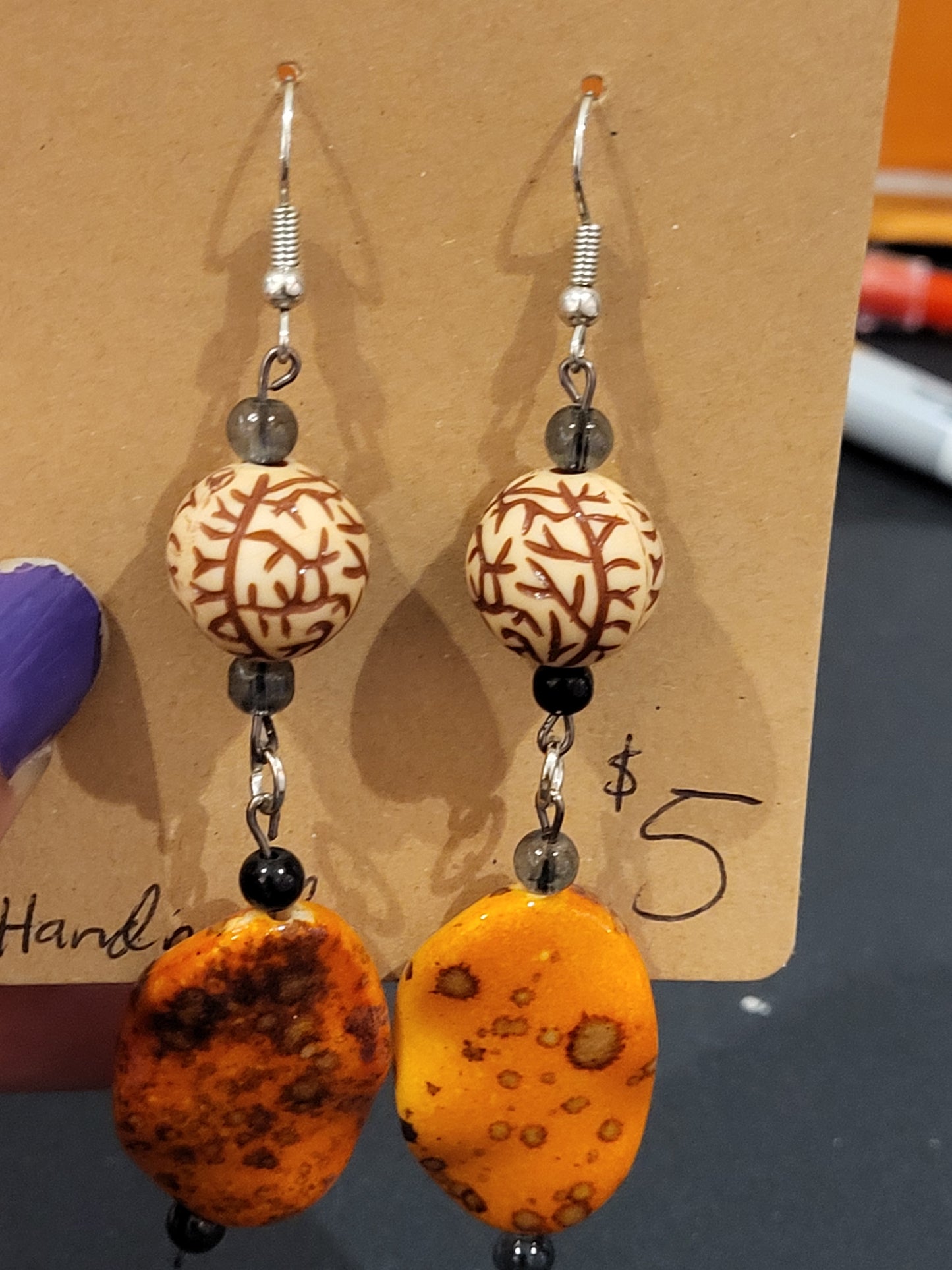 Handmade orange and tan dangle earrings