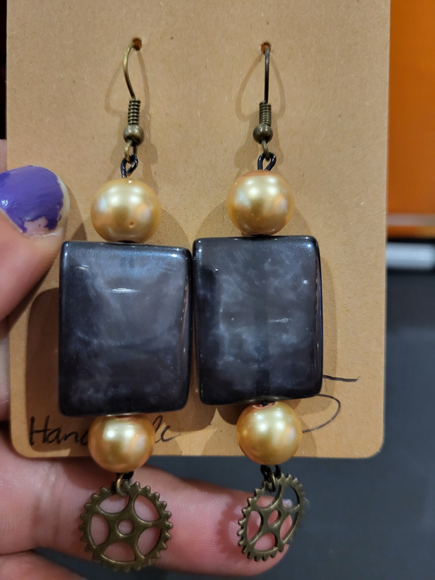 Handmade rectangle black and gold beaded earrings with gear