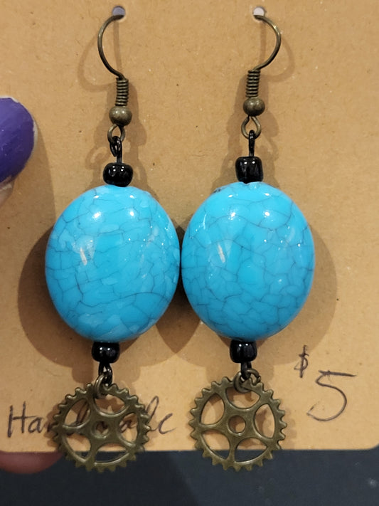 Handmade bright blue bead earrings with gear