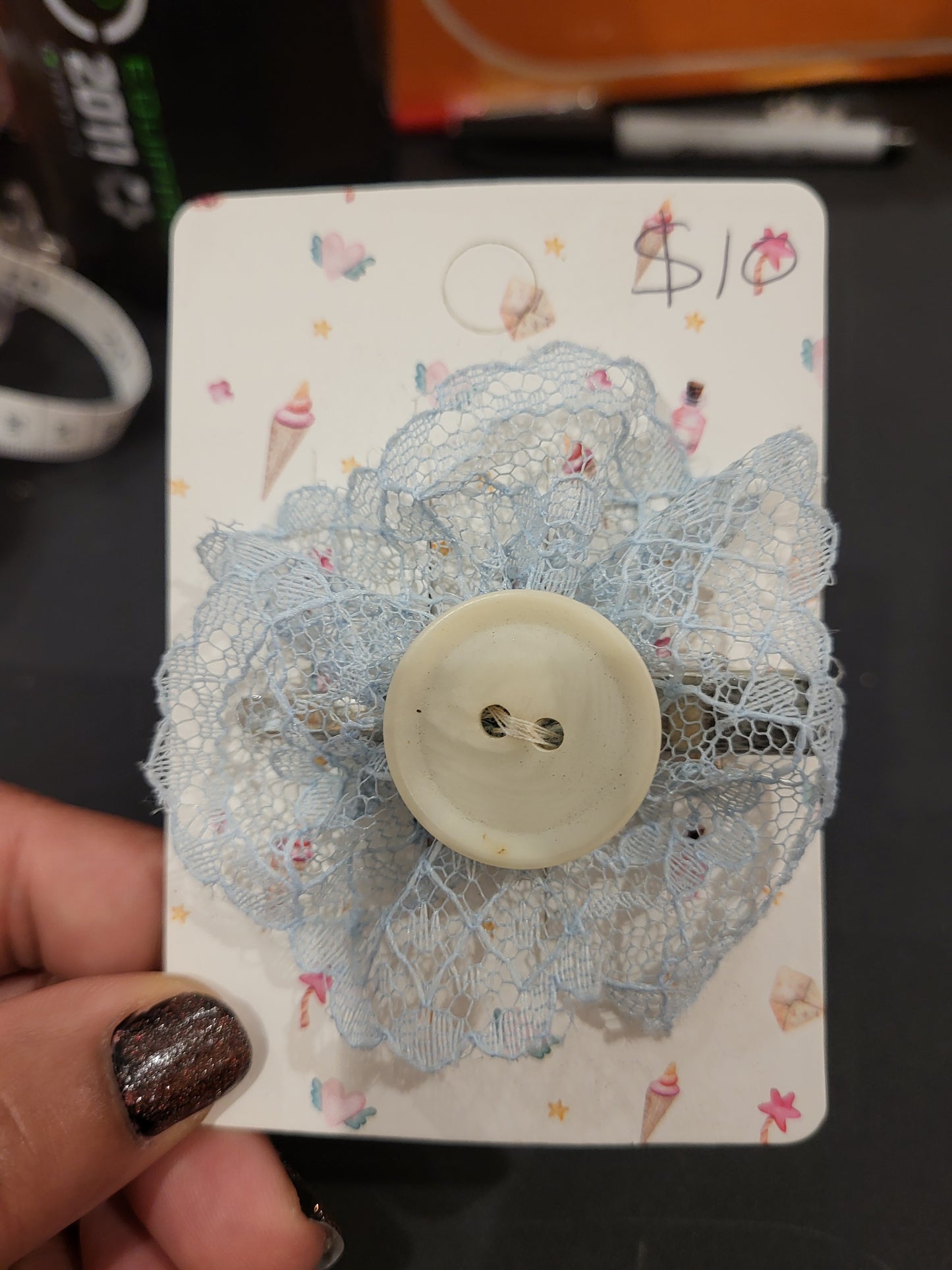 Handmade blue lace hair clip with off white button