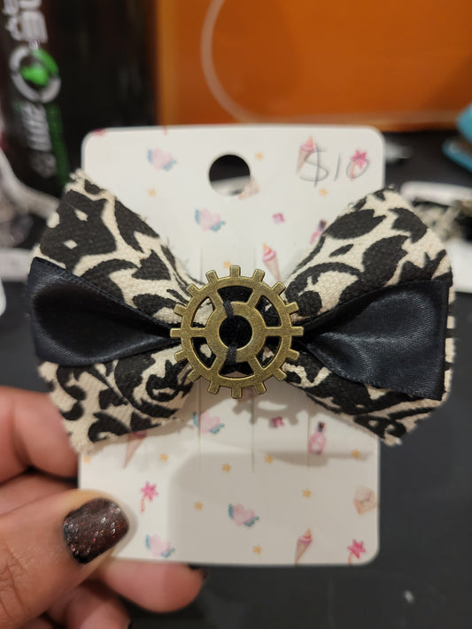 Handmade white and black hair bow with gear