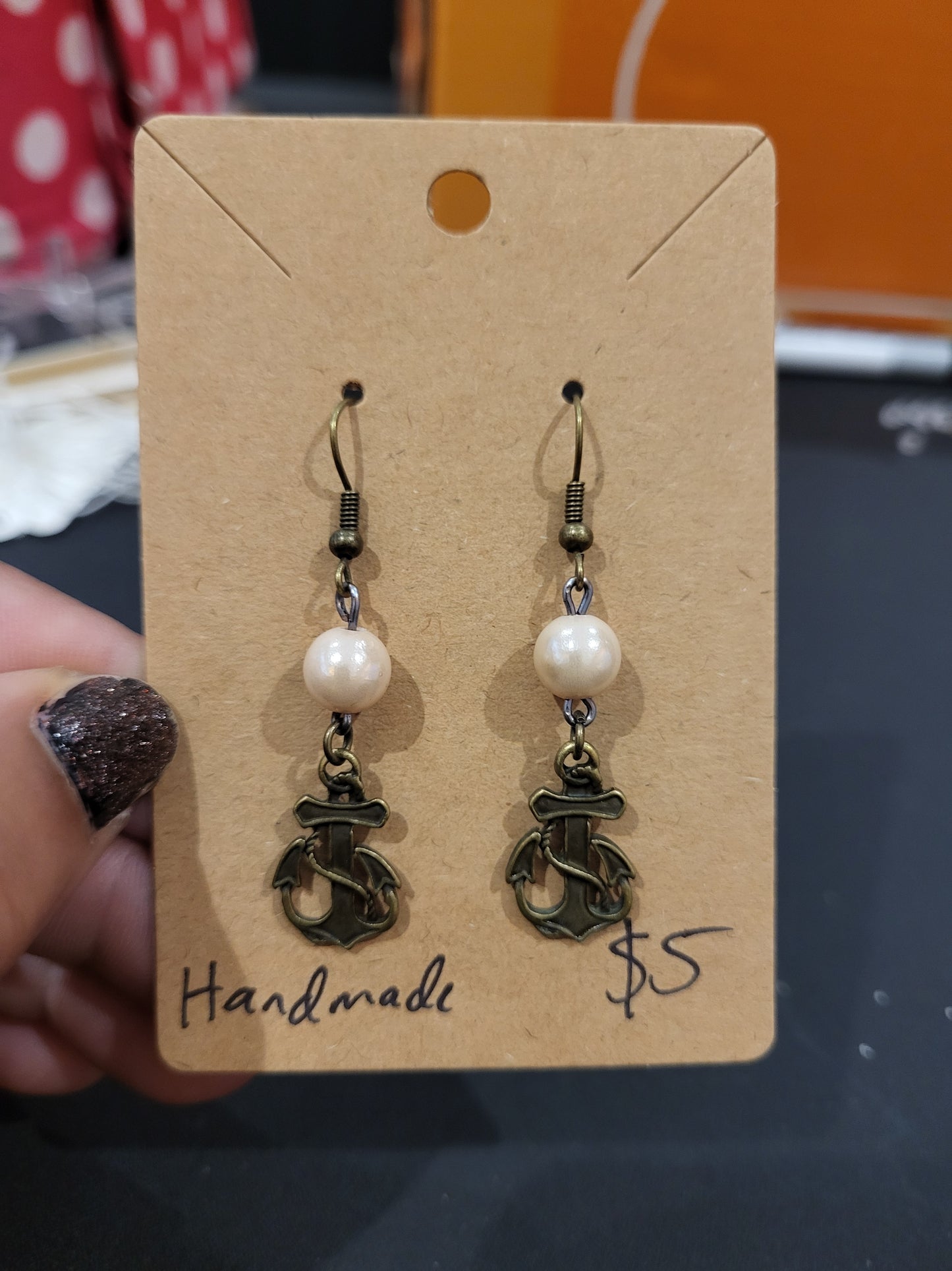 Handmade simple beige bead earrings with anchor charm