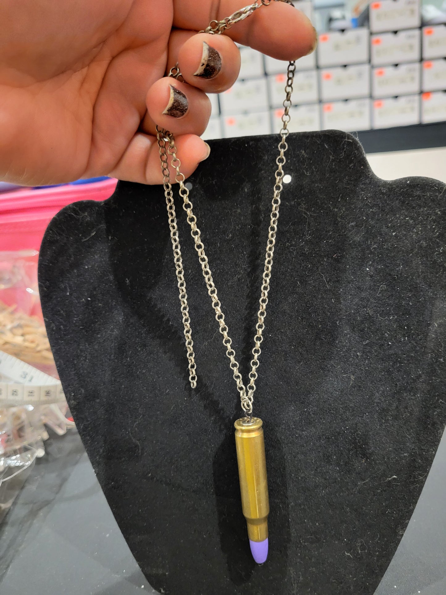 Handmade bullet casing necklace with purple wooden bead