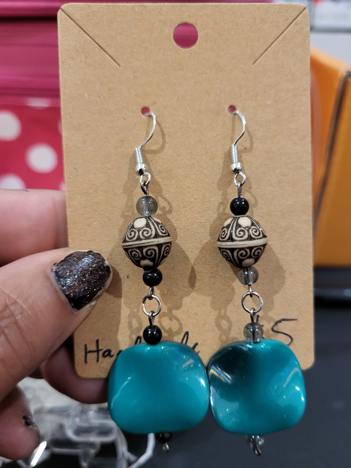 Handmade wavy green bead earrings