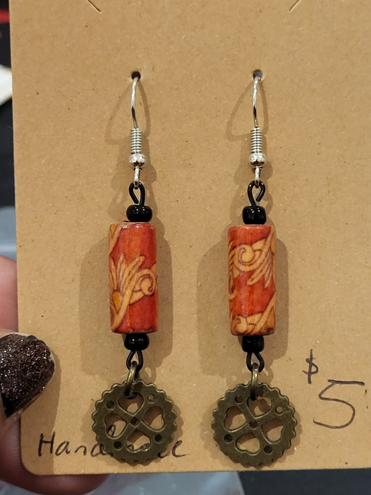 Handmade ornate red bead and heart gear earrings