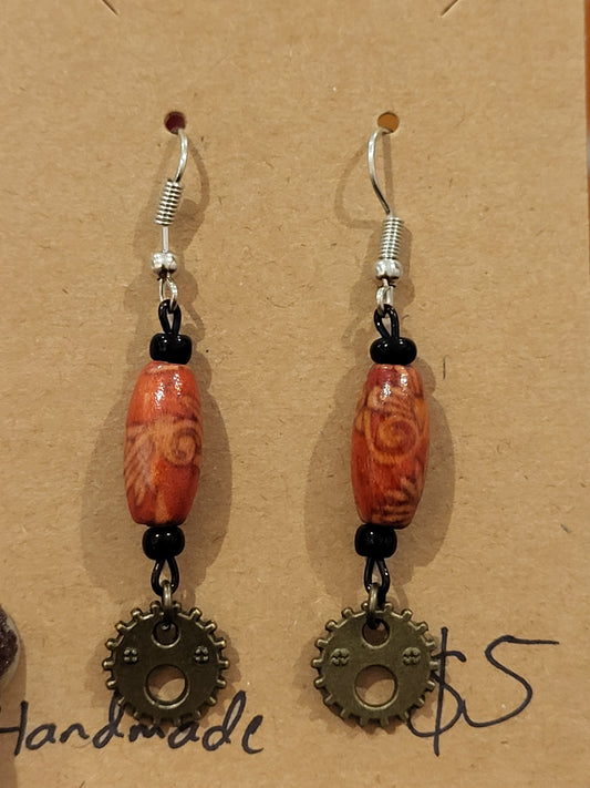 Handmade ornate red bead and gear earrings bottom