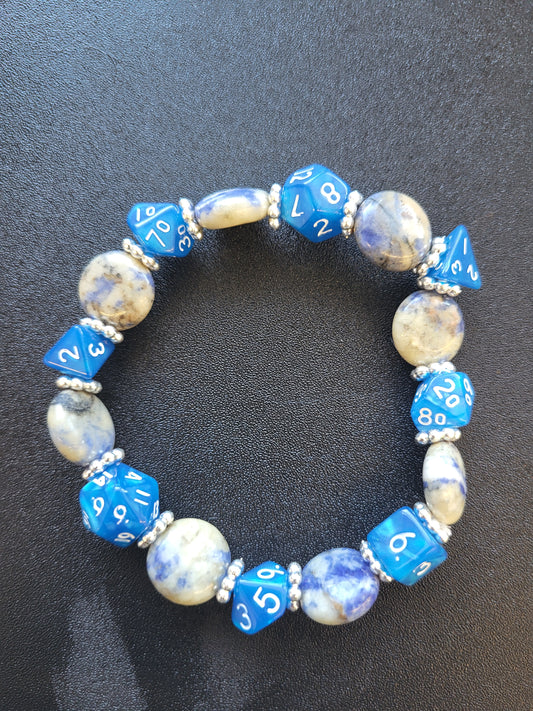 Blue and beige marbled bead and blue dice stretch bracelet