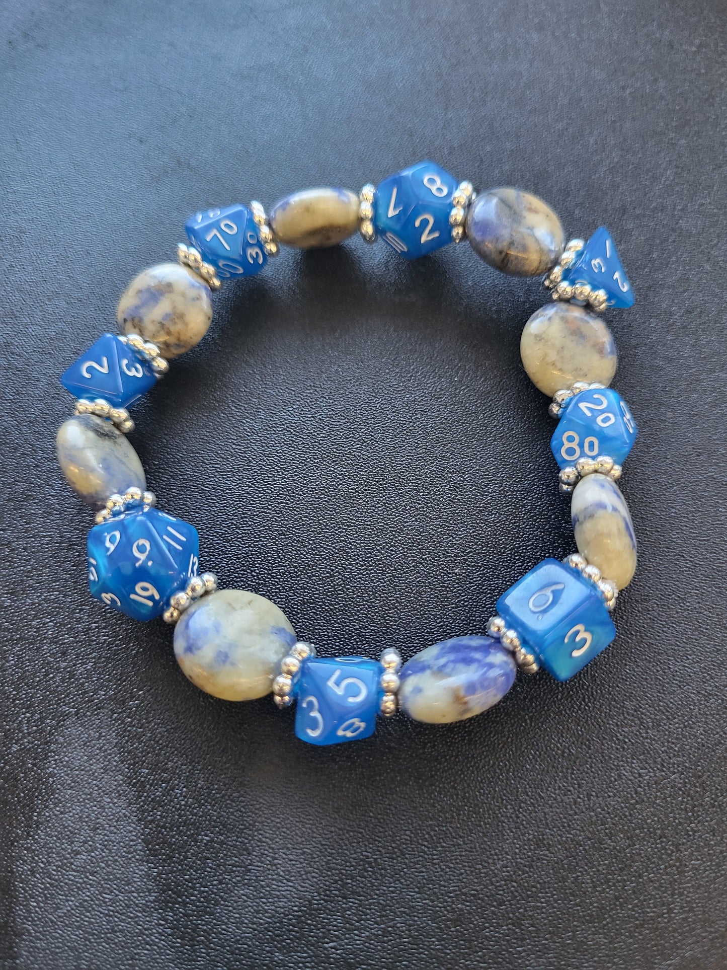 Blue and beige marbled bead and blue dice stretch bracelet