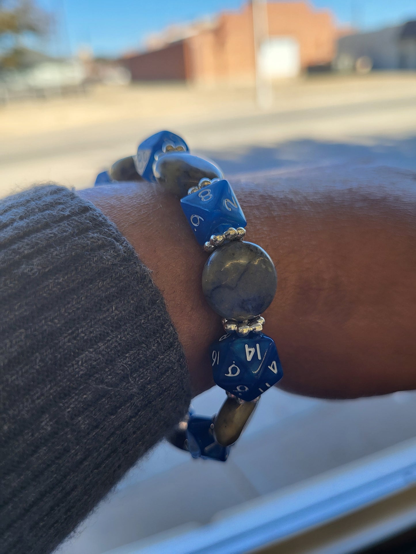 Blue and beige marbled bead and blue dice stretch bracelet