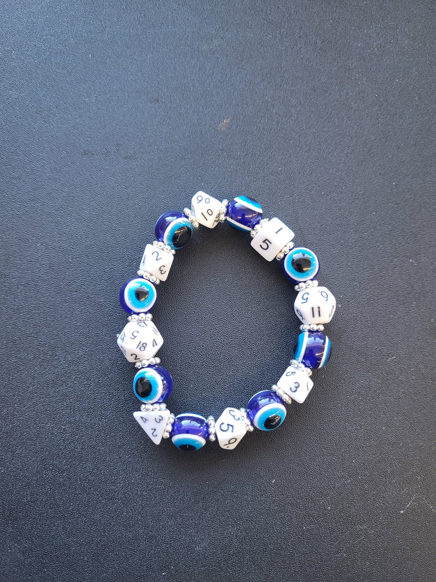 Blue eye bead and blue dice stretch bracelet