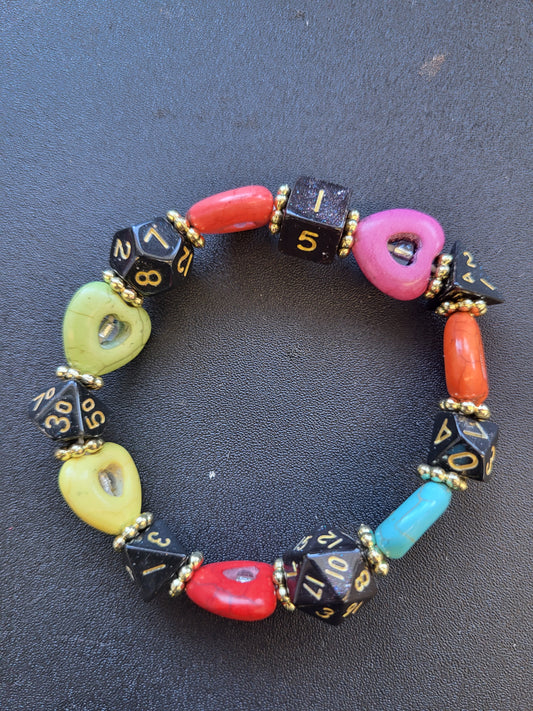 Multi colored heart bead and black dice stretch bracelet