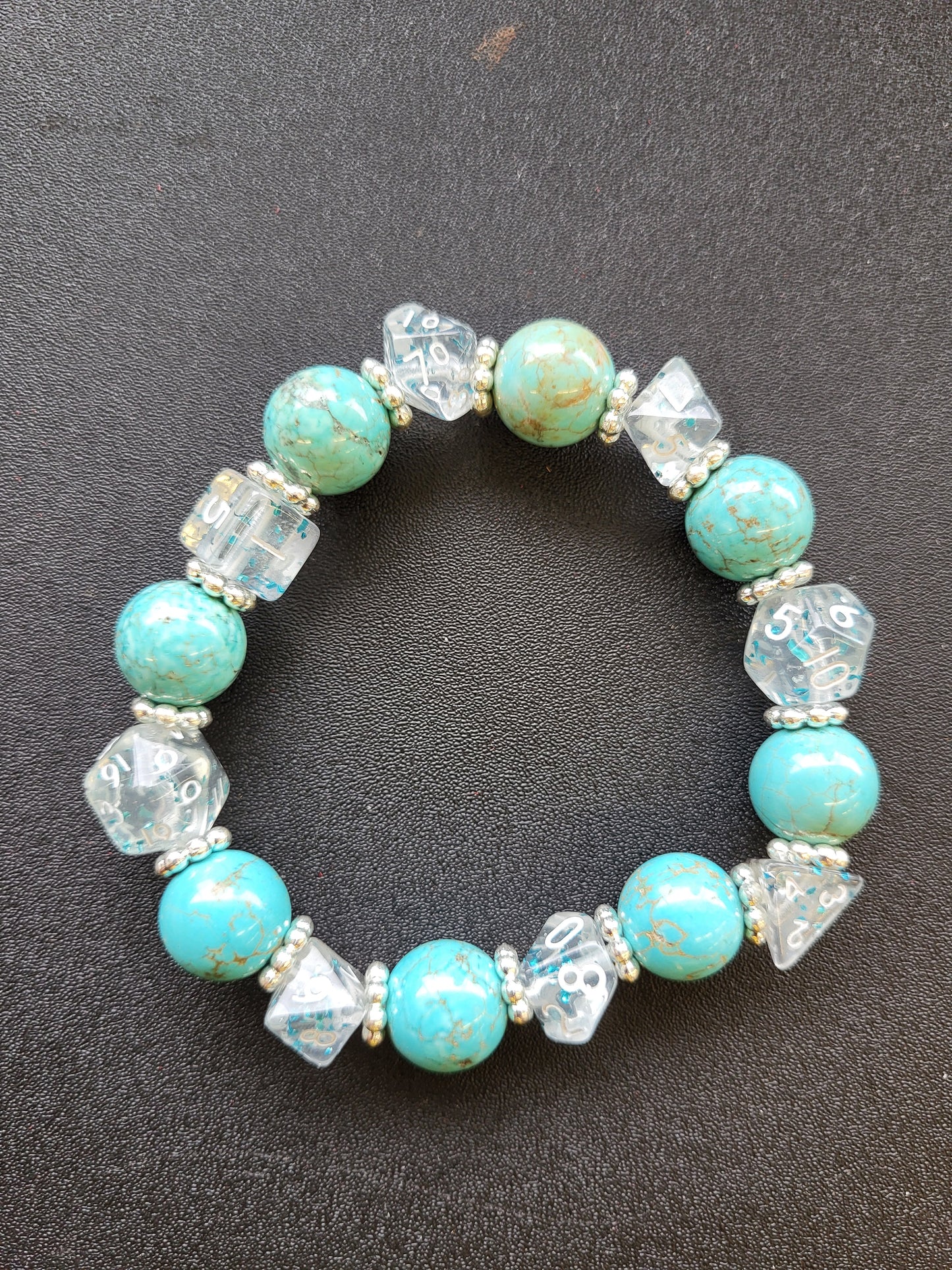 Light blue marbled bead and clear dice stretch bracelet