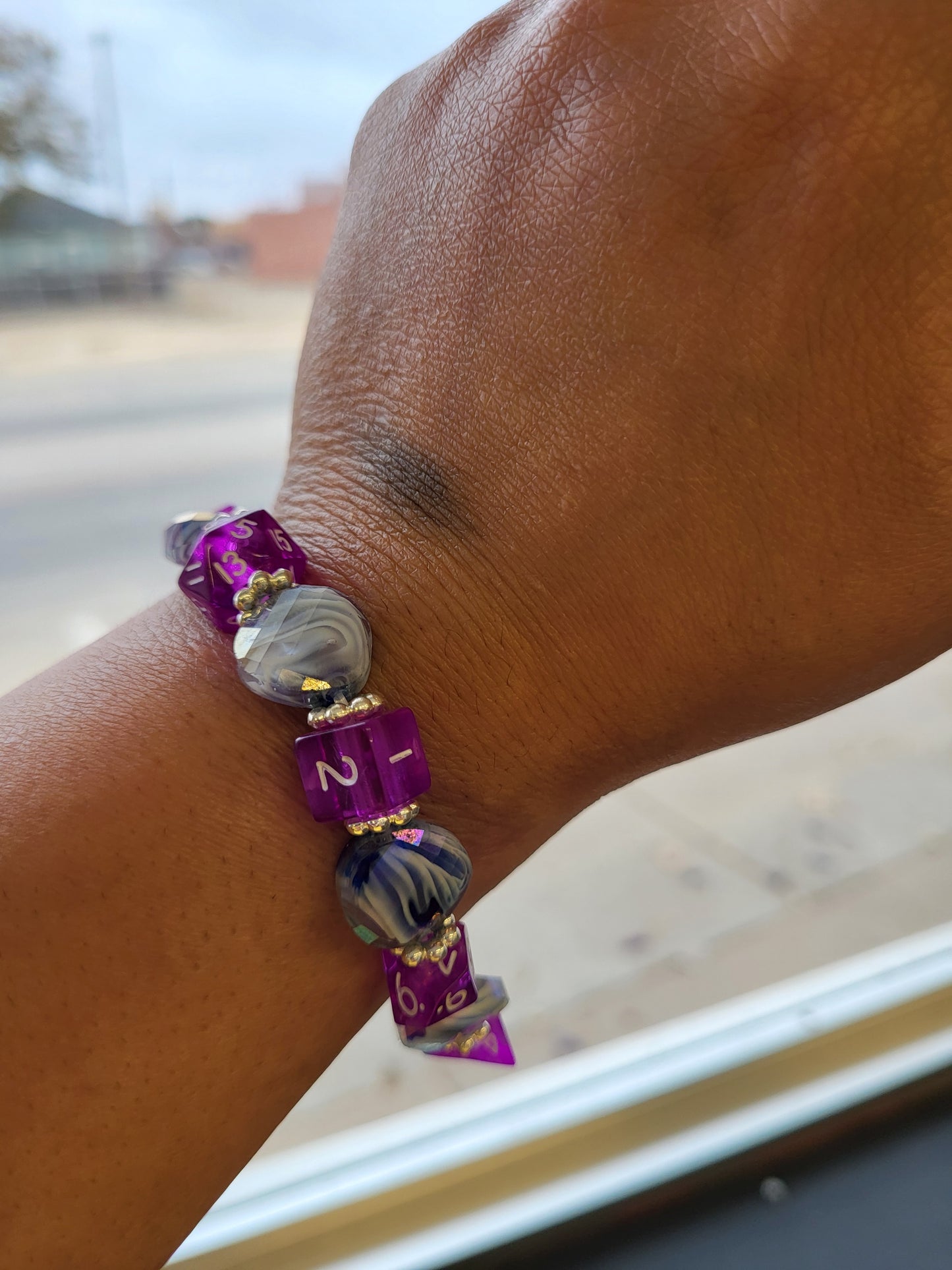 Blue and white wave bead and purple dice stretch bracelet