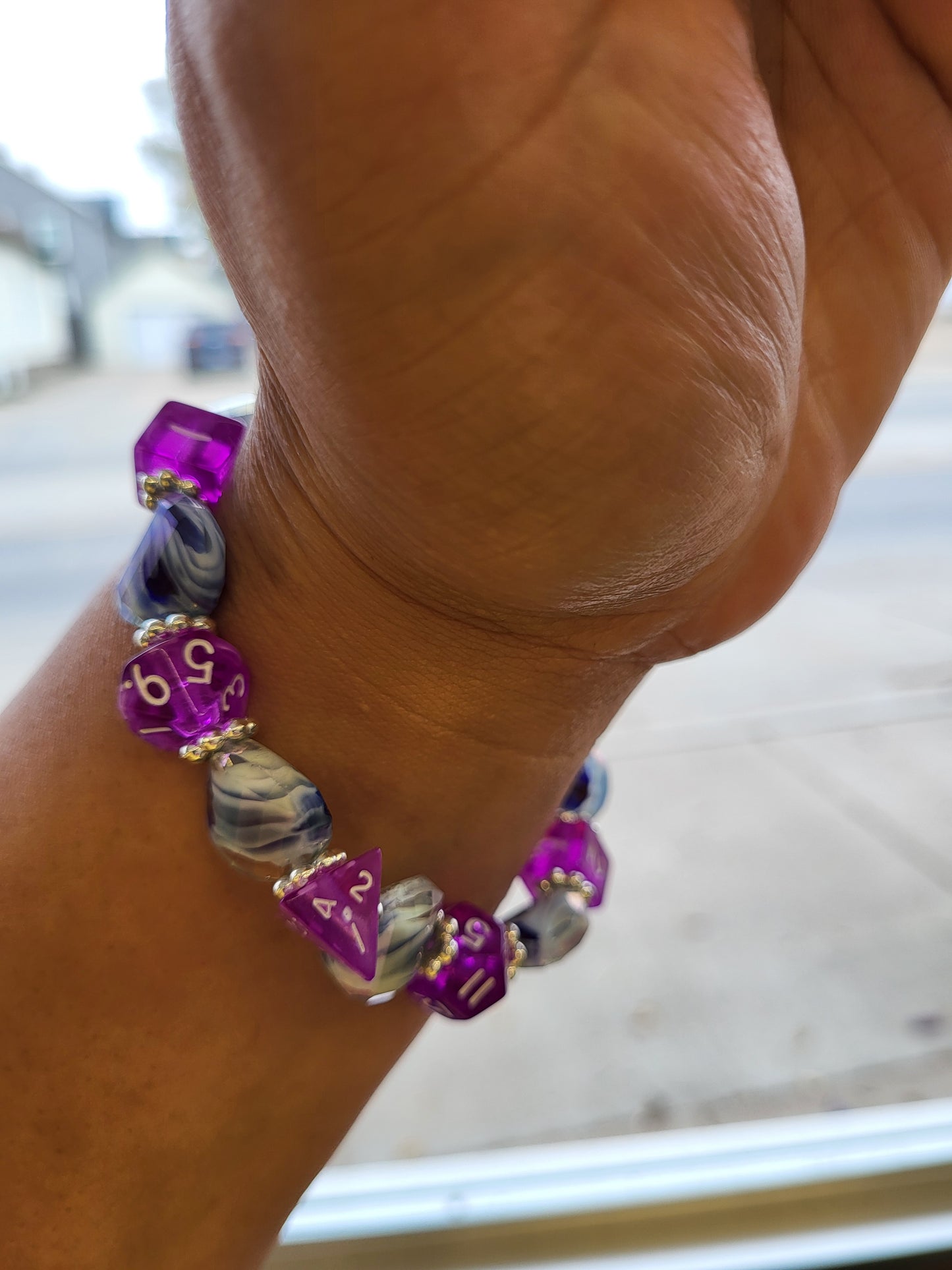 Blue and white wave bead and purple dice stretch bracelet