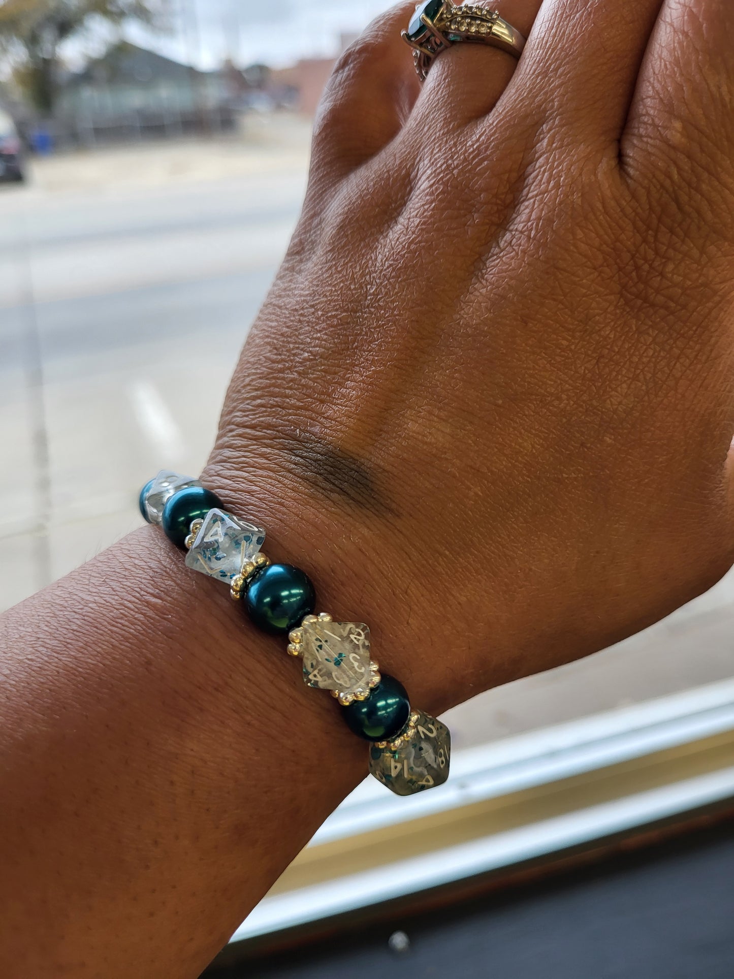 Teal bead and clear mini dice stretch bracelet