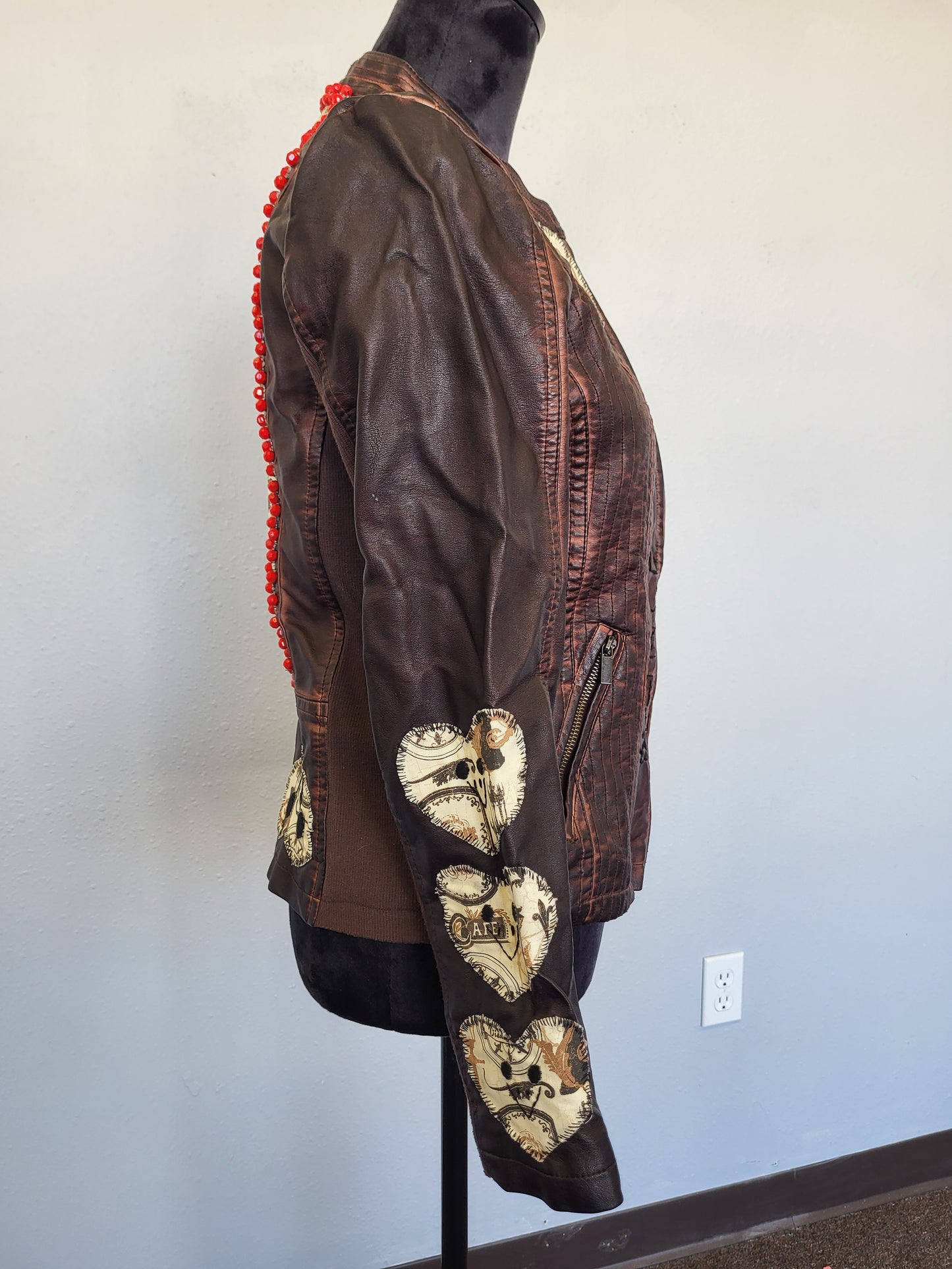 Upcycled women's faux leather jacket with patches and red beading size medium- one of a kind