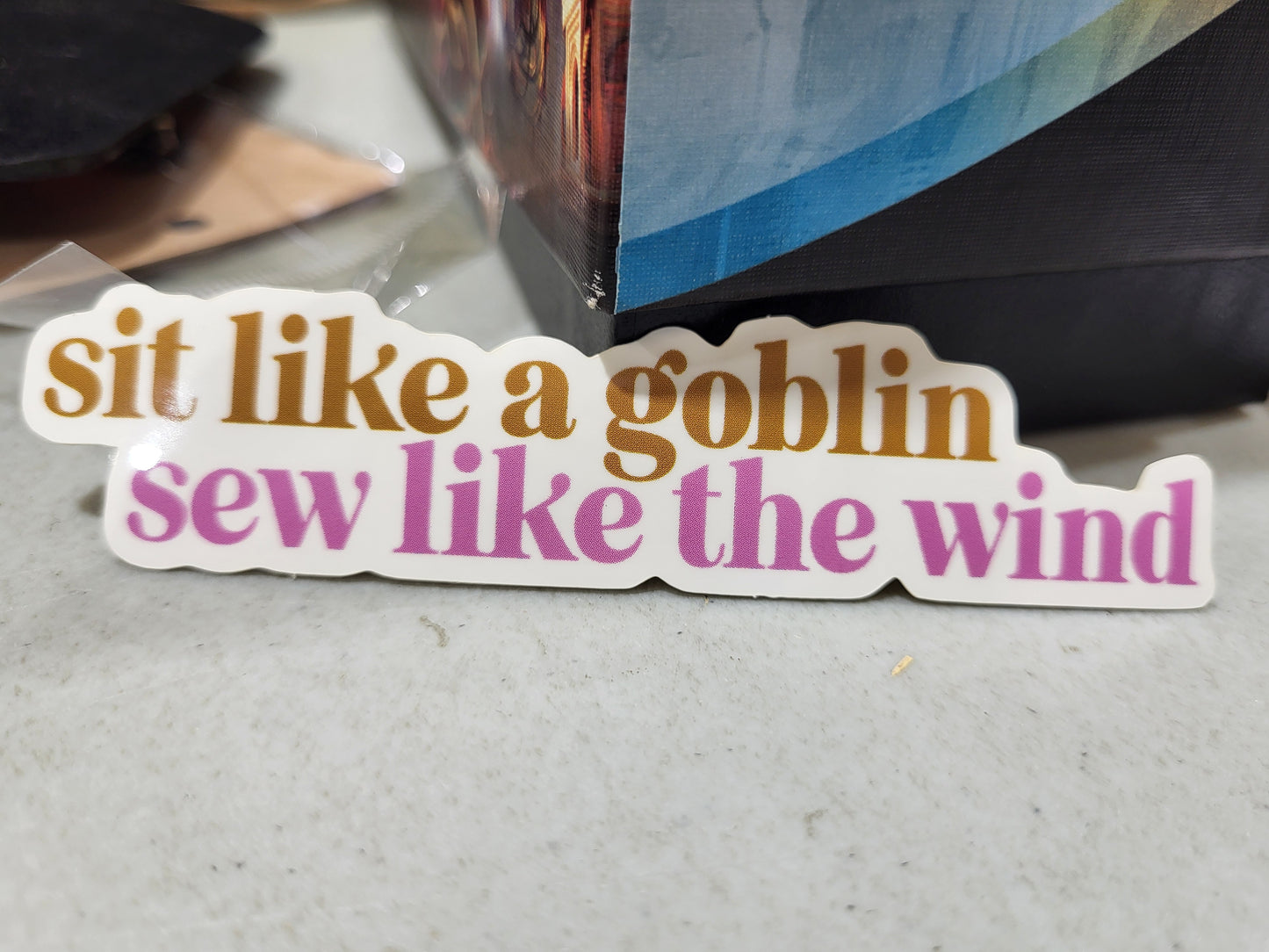 Sit like a goblin, sew like the wind vinyl sticker 1in x 4in